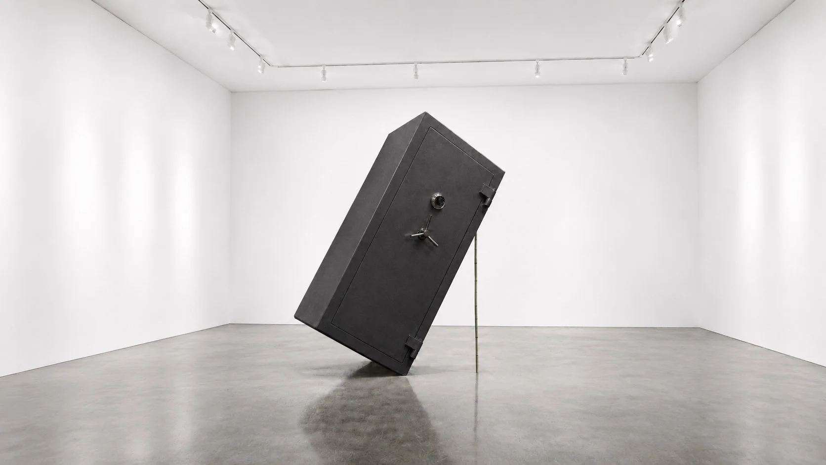 A Stick of Bamboo, 2026, Blackened steel safe, bamboo pole Approx. 10 × 5 × 4 ft.; installation dimensions variable