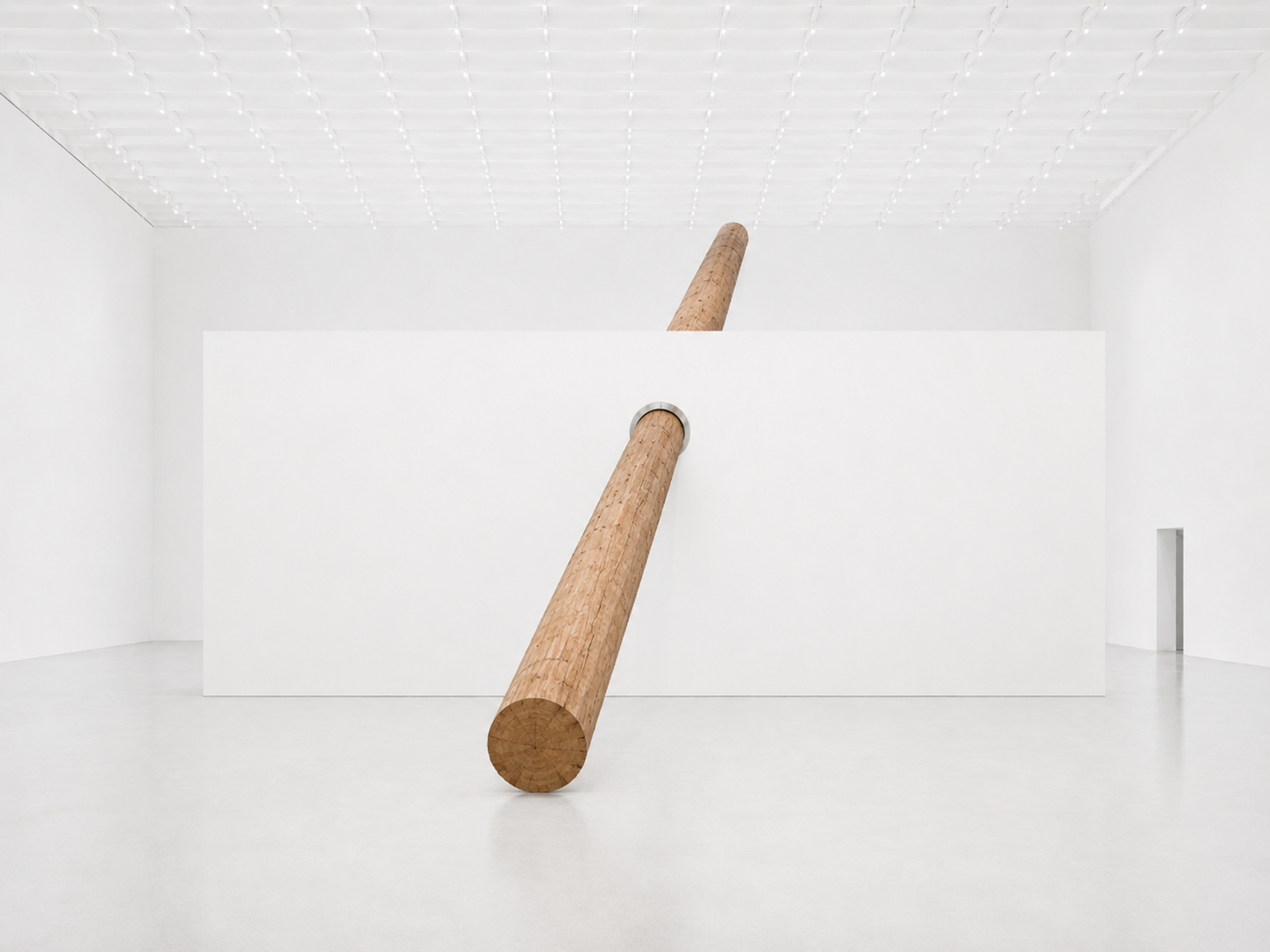 The 90-foot pole draws a line through the gallery, dividing wall, floor, and space. With Its nearly imperceptible pivot