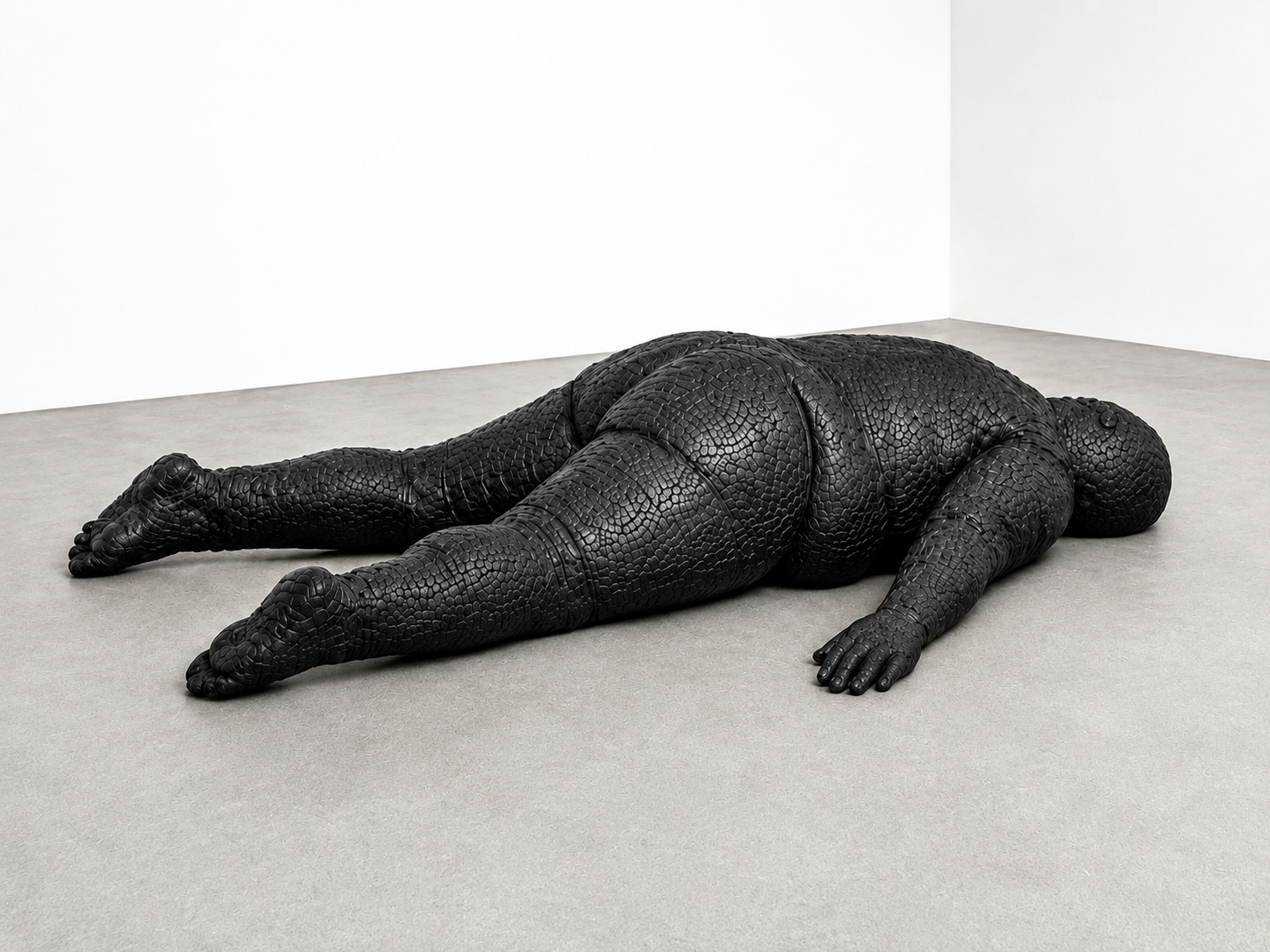 Last Postion, 2026, Hand-pounded lead over form with sulfur patina, 2.5 × 6 × 9 ft (H X W X D)