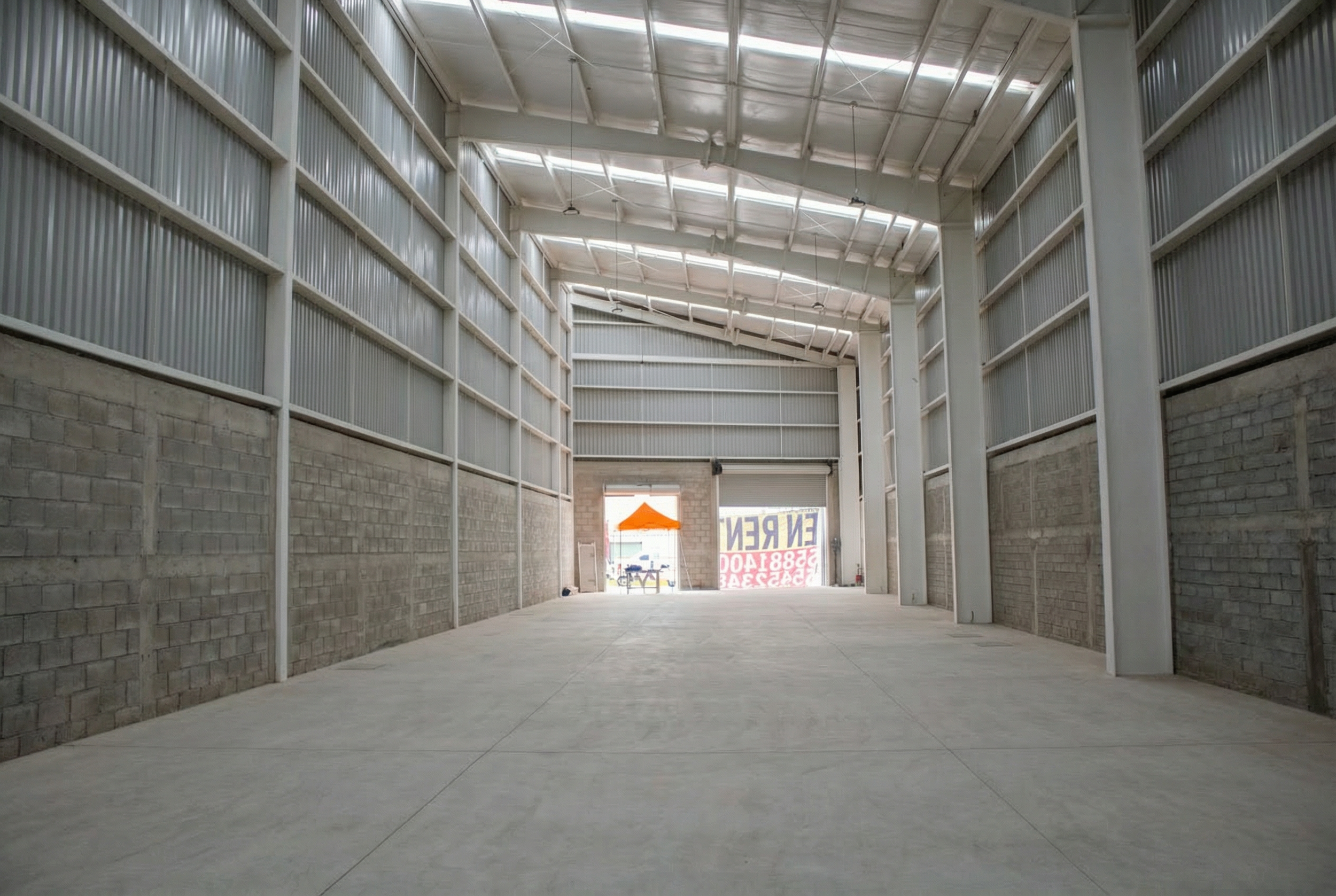 005_An_empty_warehouse_interior_features_a_concrete_ytdHIaZW.png
