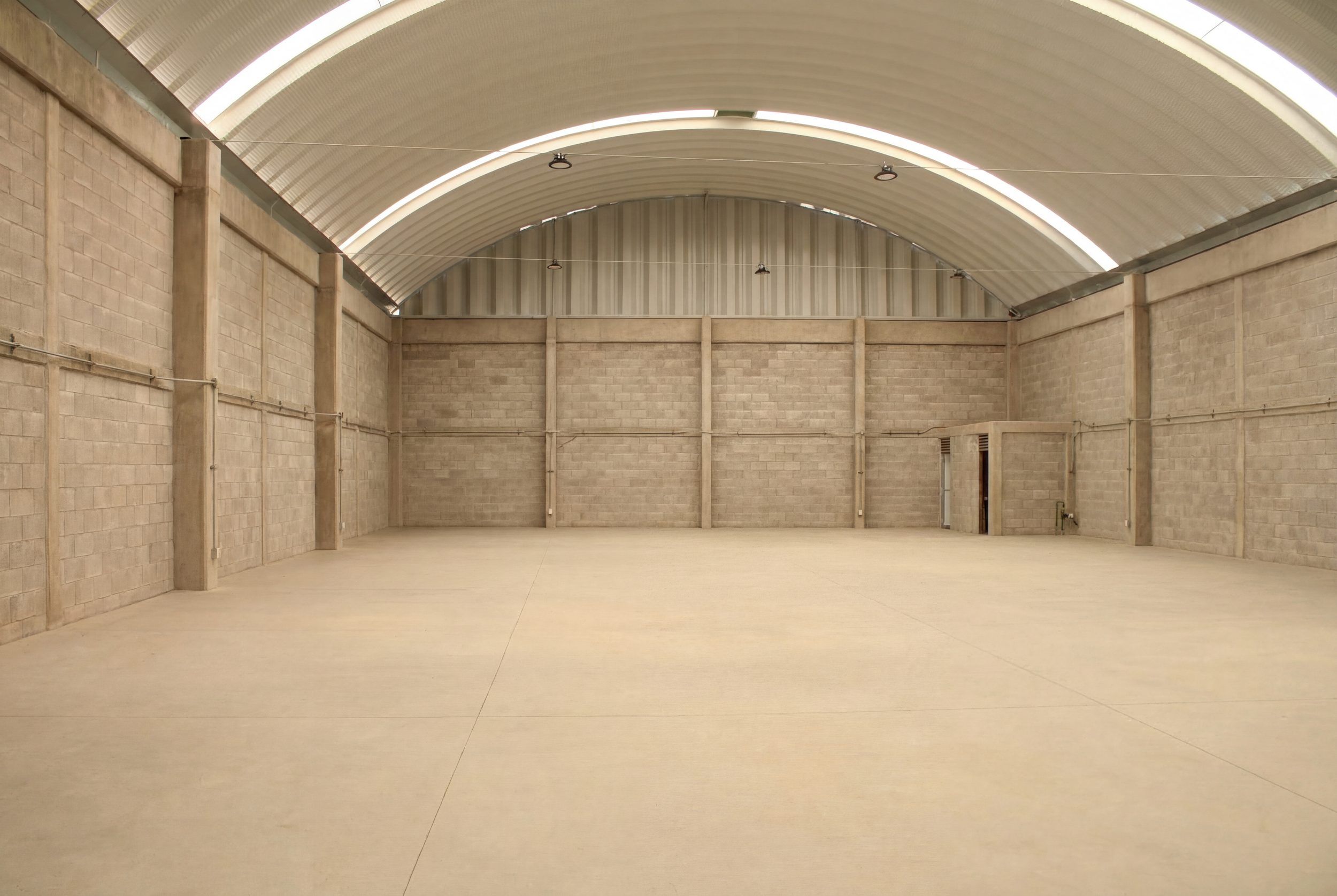 006_The_spacious_interior_of_an_empty_warehouse_is_VepgpoJp.png