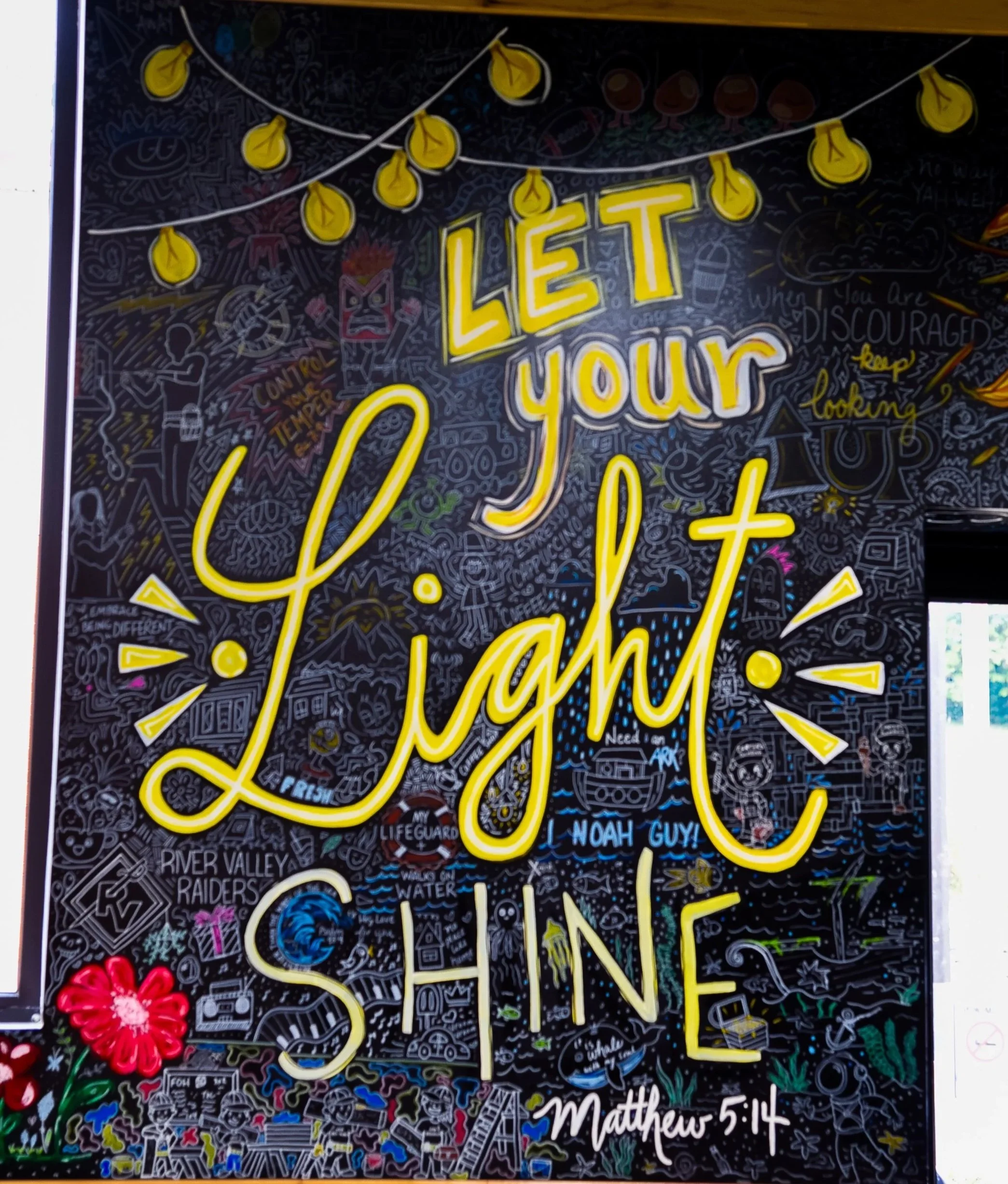 Hand-lettered elements and custom illustrations woven together to tell the story of the space. 