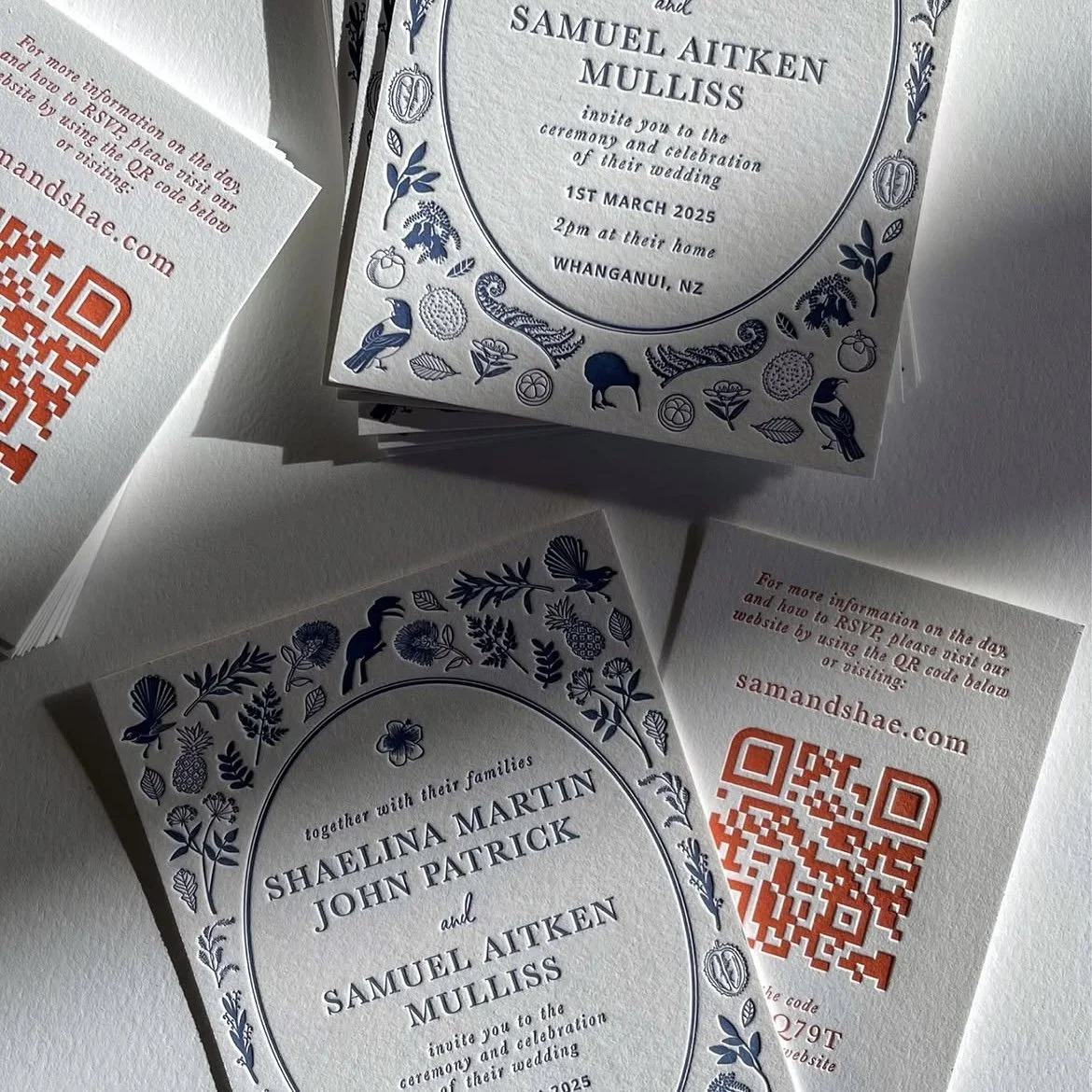 Wedding invitation cards with floral and bird designs in blue and white, with details about the wedding of Shaelina Martin, John Patrick, and Samuel Aitken Mulliss, scheduled for March 1, 2025, in Whanganu, New Zealand. Includes QR codes for RSVPing and more information.