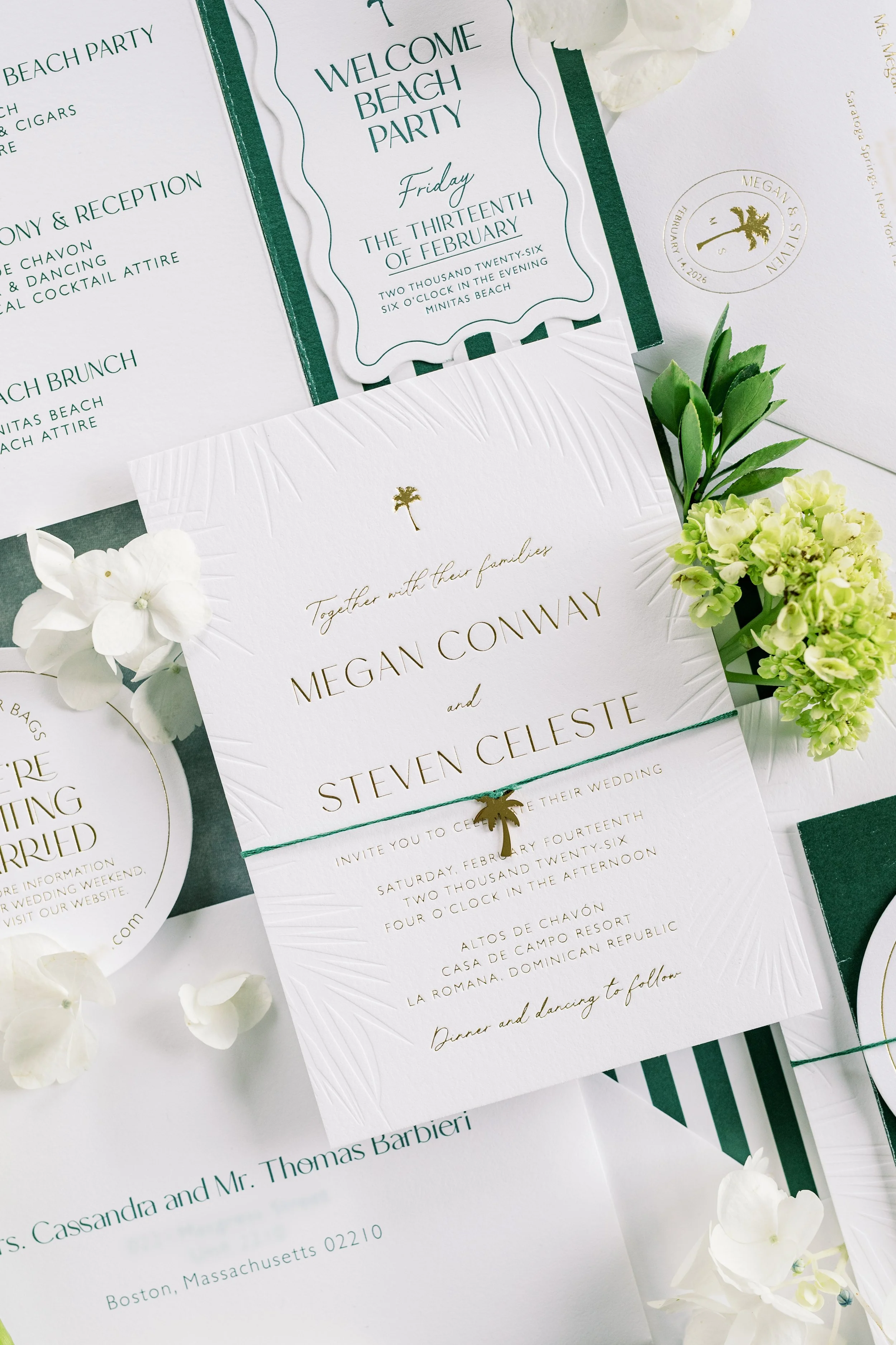 Wedding invitation and event details for a beach party and wedding, decorated with white flowers and green leaves.