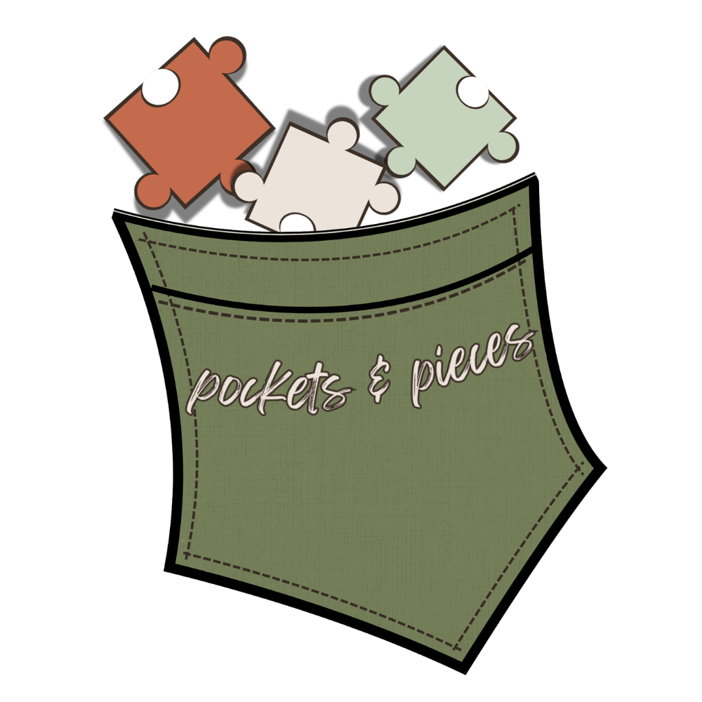 A green fabric pocket with the words "pockets & pieves" stitched on it, containing three puzzle pieces in brown, beige, and light green colors.
