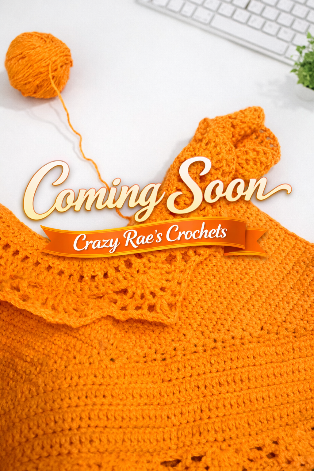 Orange crochet projects on a white surface with a keyboard and green plant in the background, featuring text overlay that says "Coming Soon" and "Crazy Rae's Crochets."