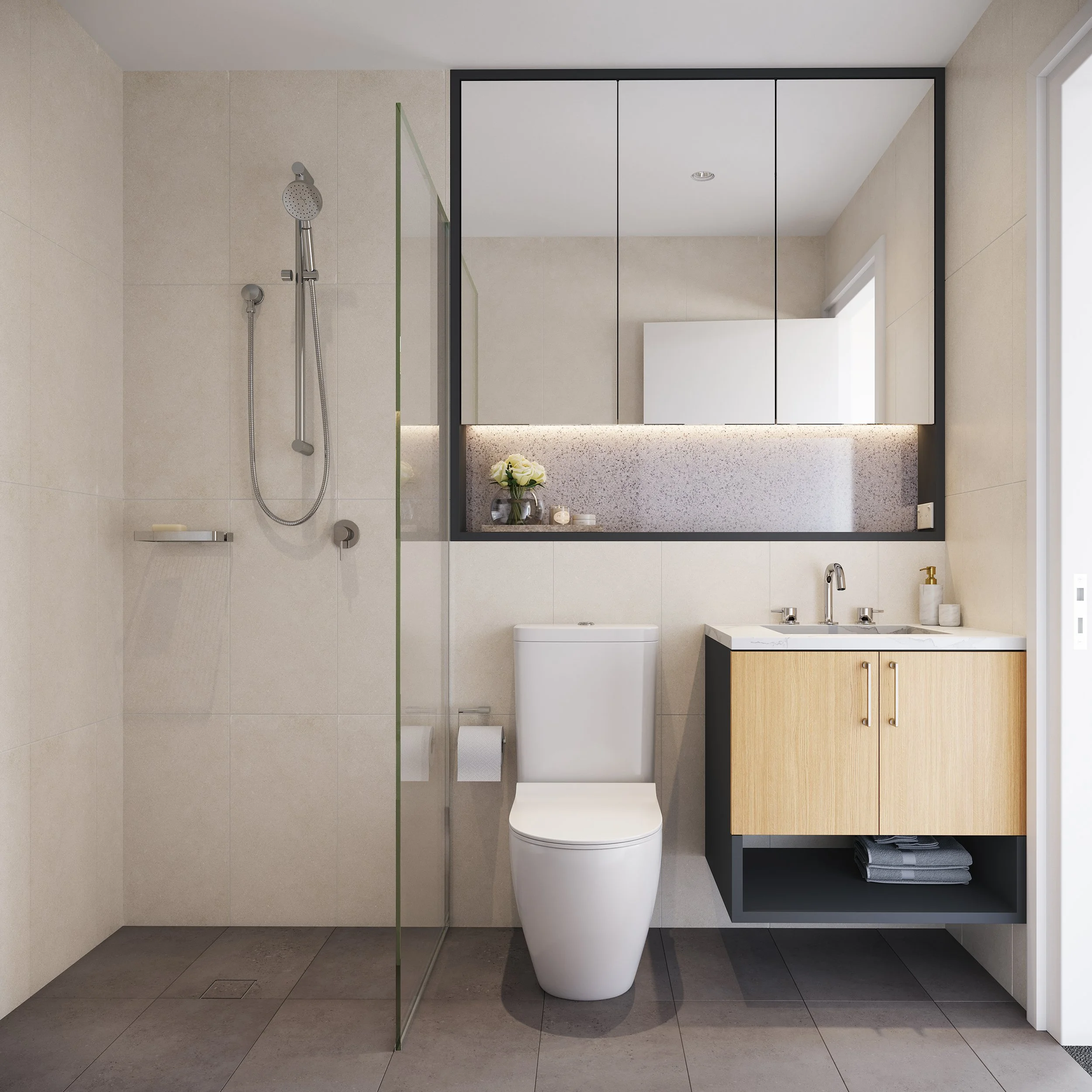 Modern bathroom with beige tiled walls, walk-in shower, toilet, and a wooden vanity with a mirror above.