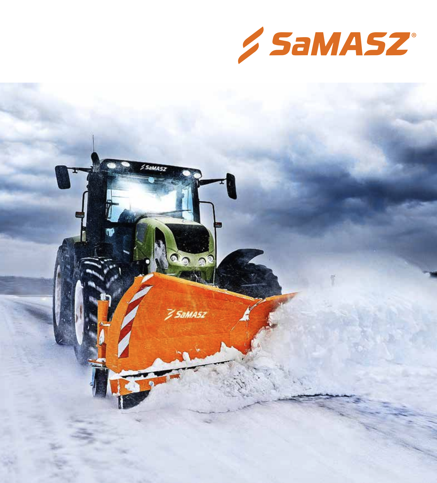 A green and black snowplow tractor clearing snow from a snowy field under cloudy sky.