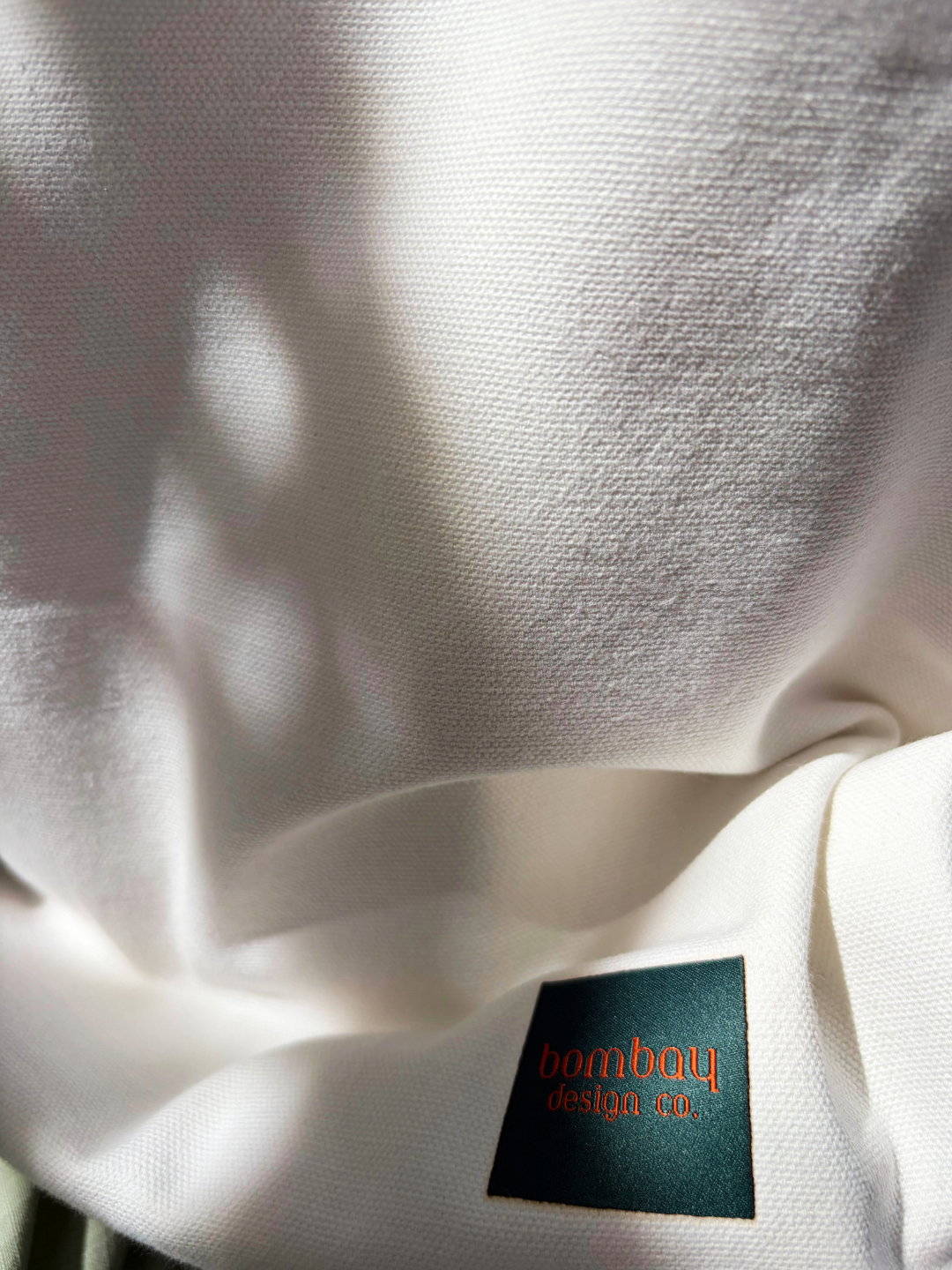 Sunlight reflects and highlights the details of the weave of a cotton fabric used by Bombay Design Co. for its products.