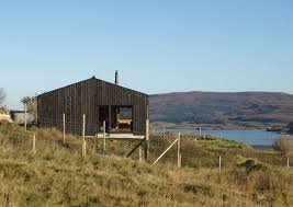 THE BLACK SHED - Sleeps 2. Nestled amongst the foothills of Macleods Tables, The Black Shed is a stylish self-catering experience with views towards Loch Dunvegan.