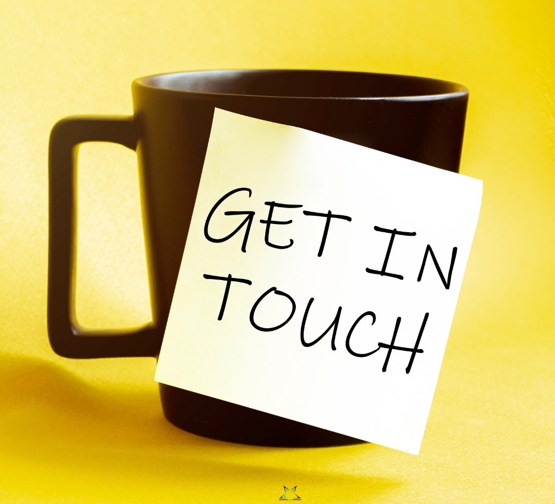 Image shows a dark mug on a bright yellow background. There is a yellow post-it note stuck to the mug that says Get In Touch