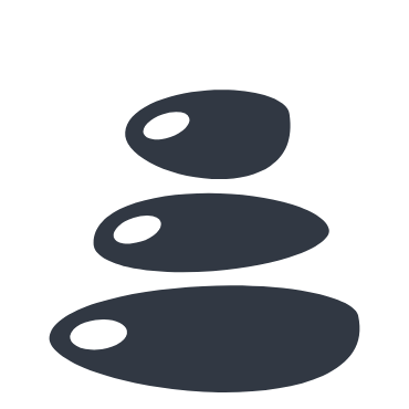 Stacked black stones arranged in a balanced, peaceful formation.