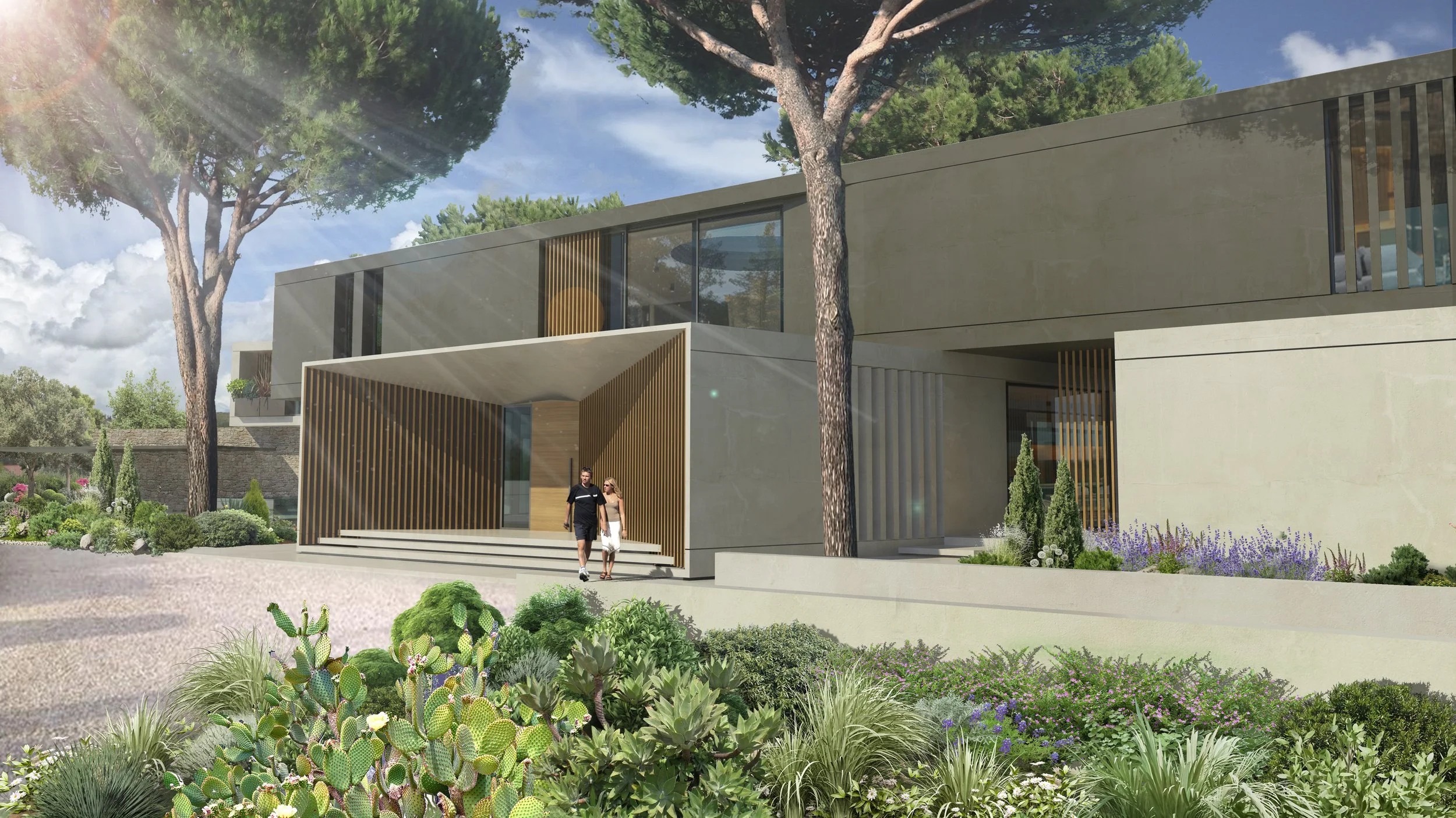Immagine di un edificio moderno con un ingresso con pannelli di legno, circondato da piante e alberi, con due persone che si avvicinano all'ingresso, sotto un cielo sereno con alcune nuvole.