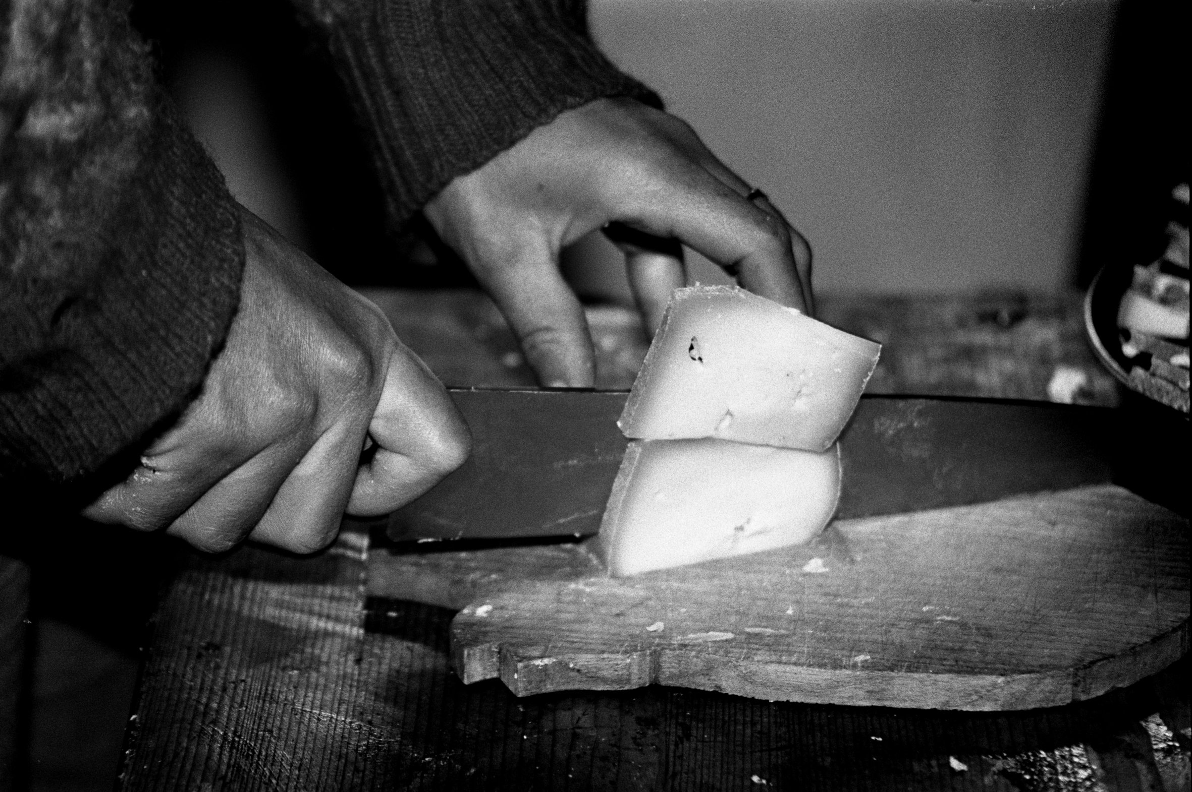 Agnes cutting alp cheese