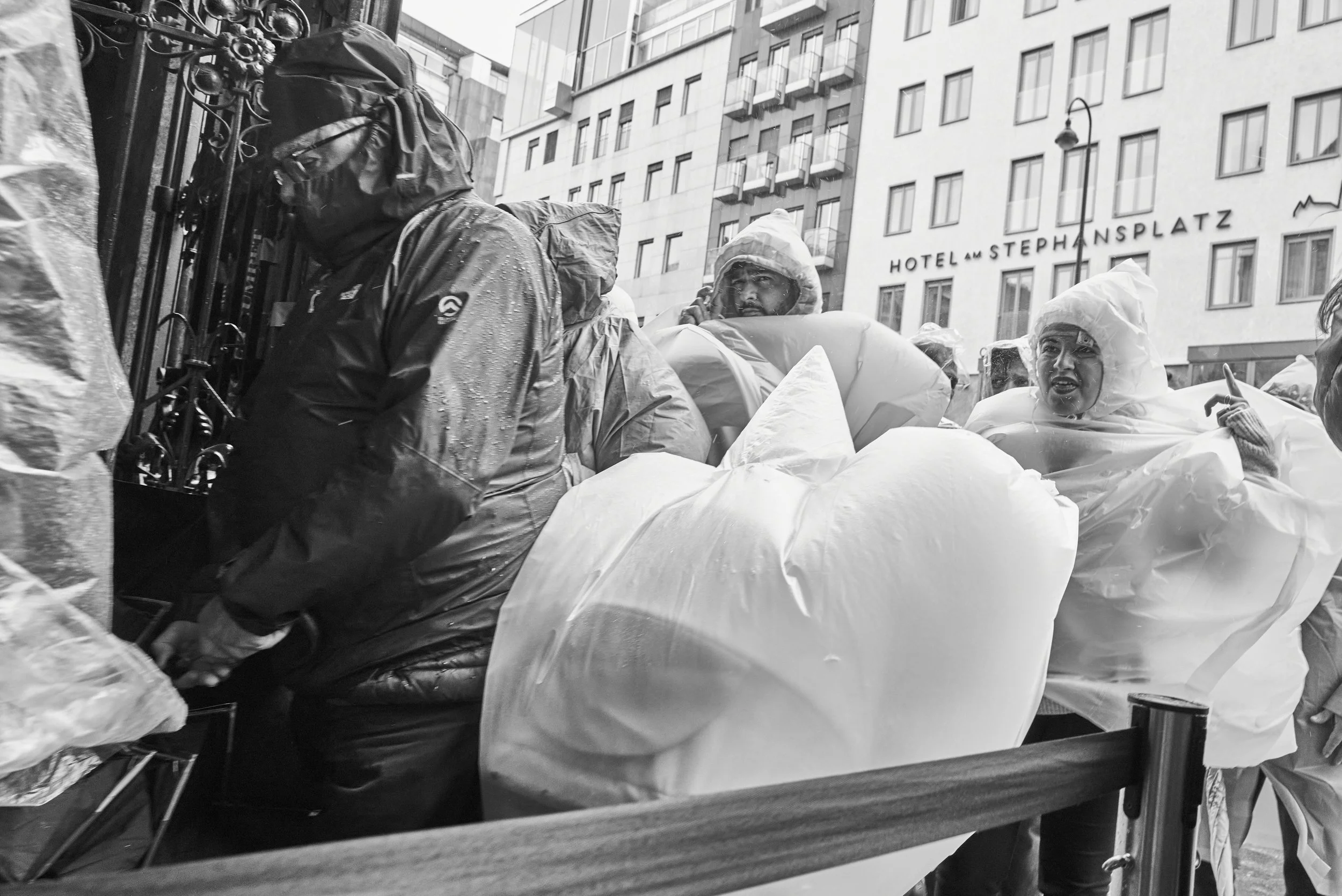 People queuing to get into the dry and warm Church