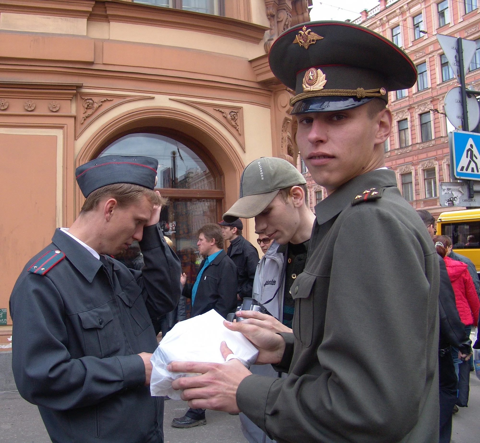 Police questioning a young man