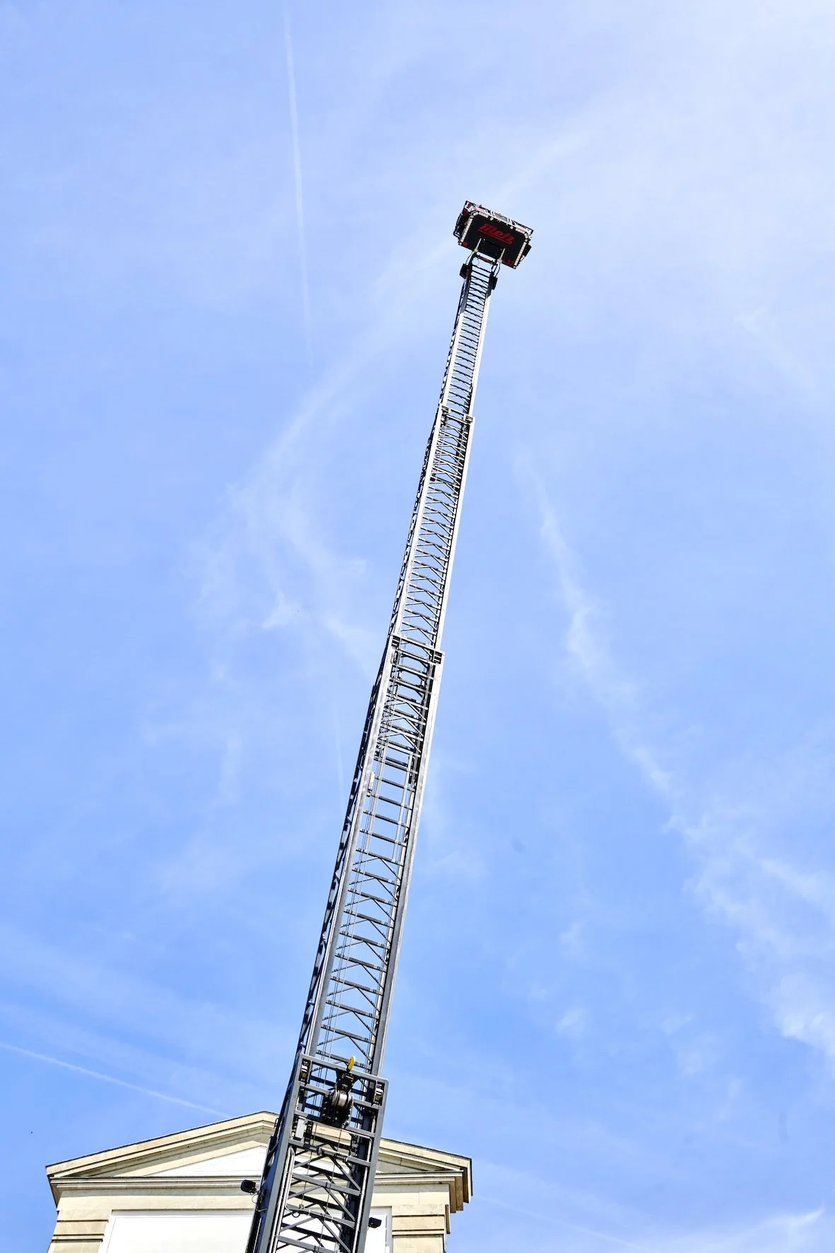 Fire-engine ladder fully extended to 70 metres during a village fête 