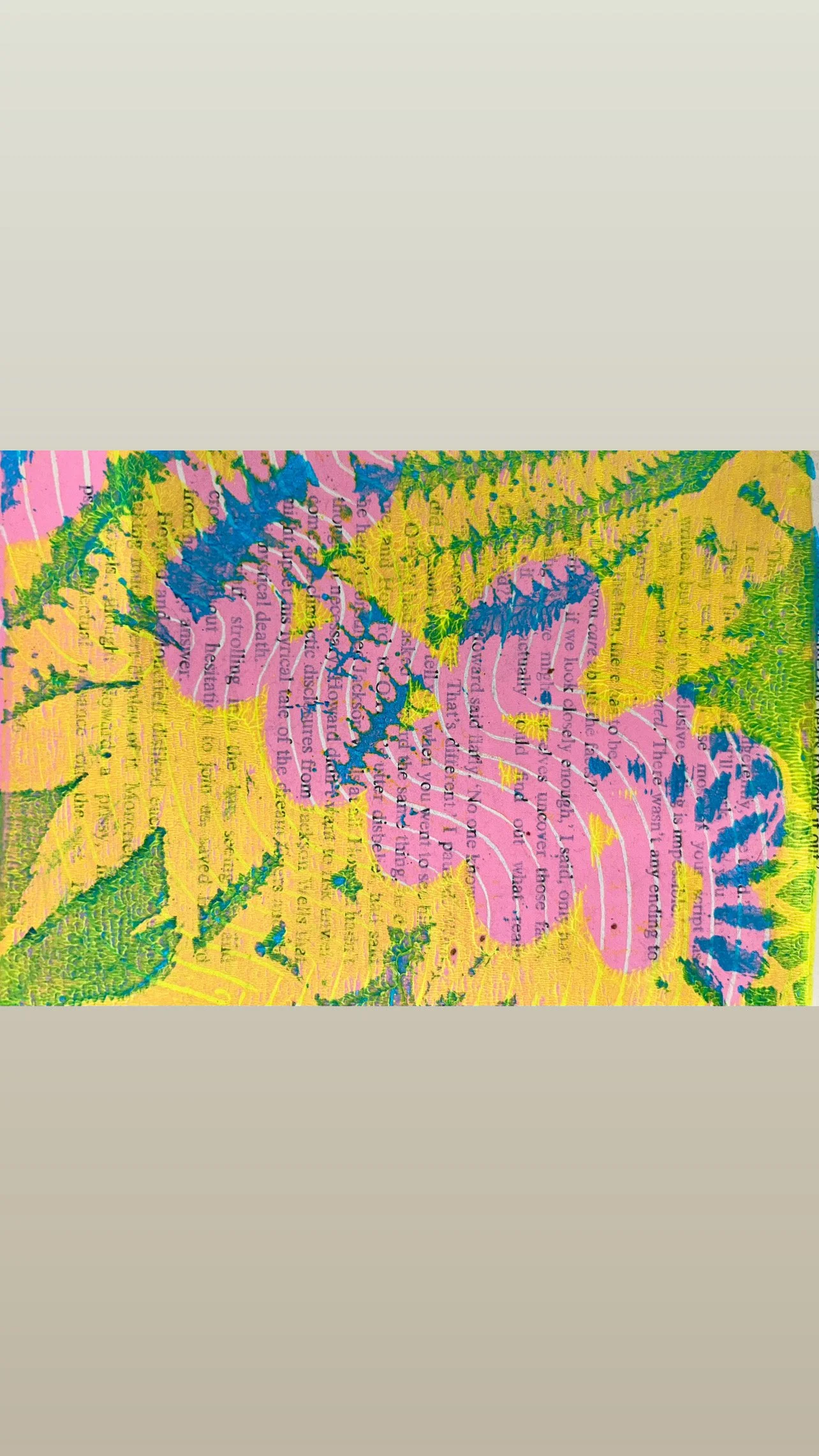 Layered botanical Gelli print using vibrant acrylic paints and textures printed on a book page.