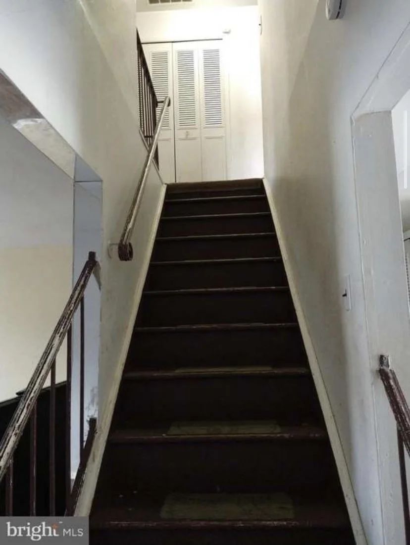 An image of the staircase before.