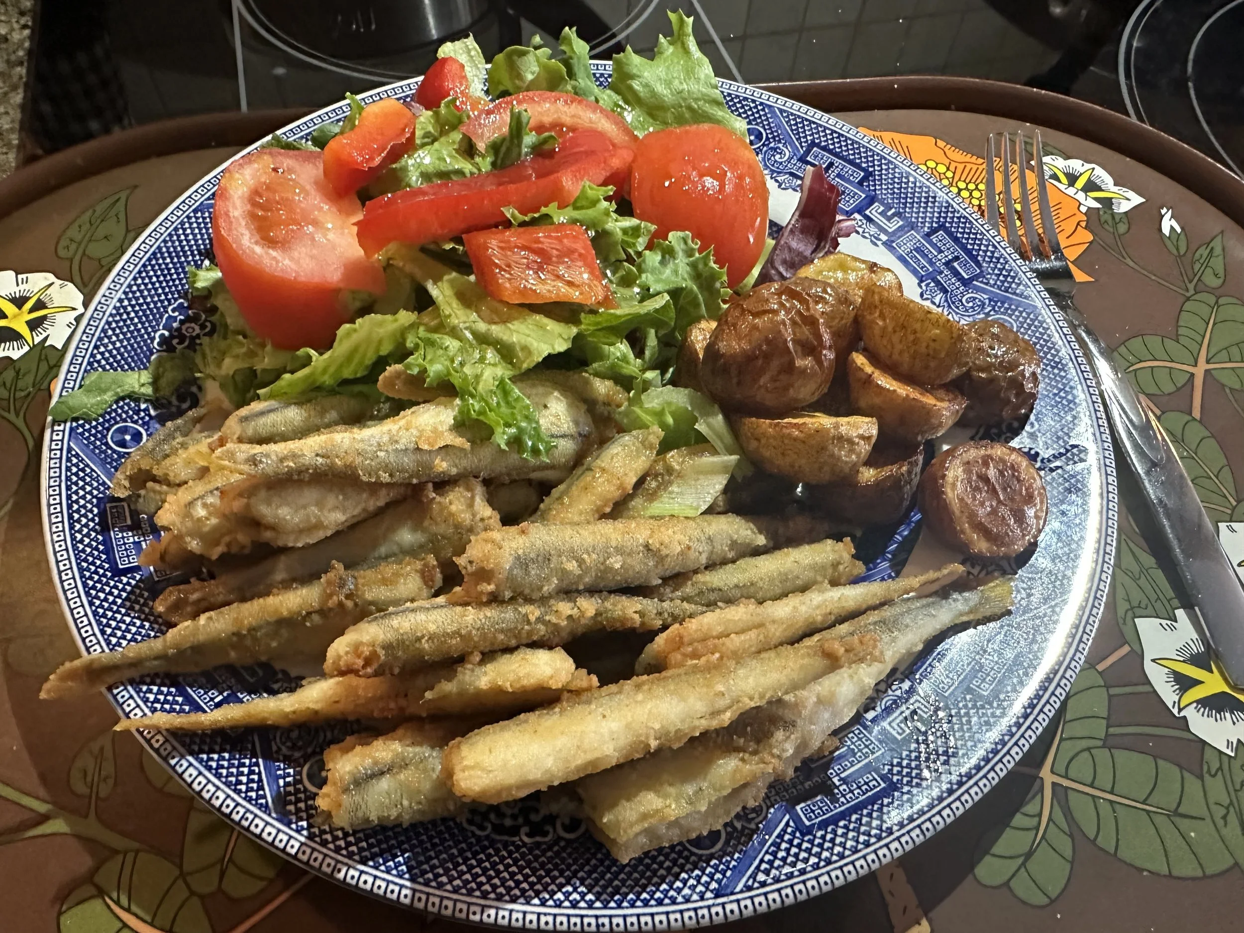Smelts, salad and air fried potatoes 