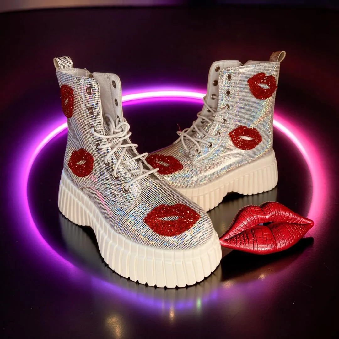 Loving these boots. Bit extra, bit unapologetic, exactly the point.

Crystal shine with those red lip details just does the work for you. Throw them on with denim, dresses, whatever mood you&rsquo;re in and they carry it.

Core Collection, &pound;95.
