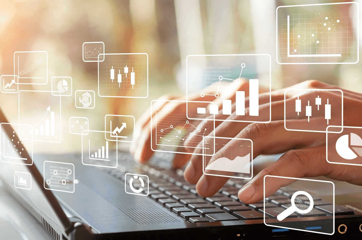 Hands typing on a laptop from hotel digital marketing consultant