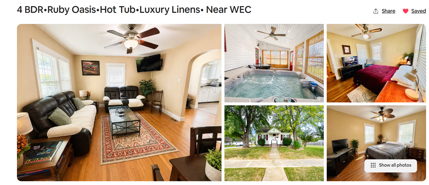A collage of five photos showing the interior and exterior of a rental property. The interior includes a living room with beige walls, wooden floors, black leather sofas, a TV, a ceiling fan, and a rug; a sunroom with a hot tub and large windows; a bedroom with a bed, dresser, and TV; another bedroom with a bed, dresser, and window; and a third bedroom with a bed, TV, and plants. The exterior photo shows a house with a large tree, a lawn, and a walkway.