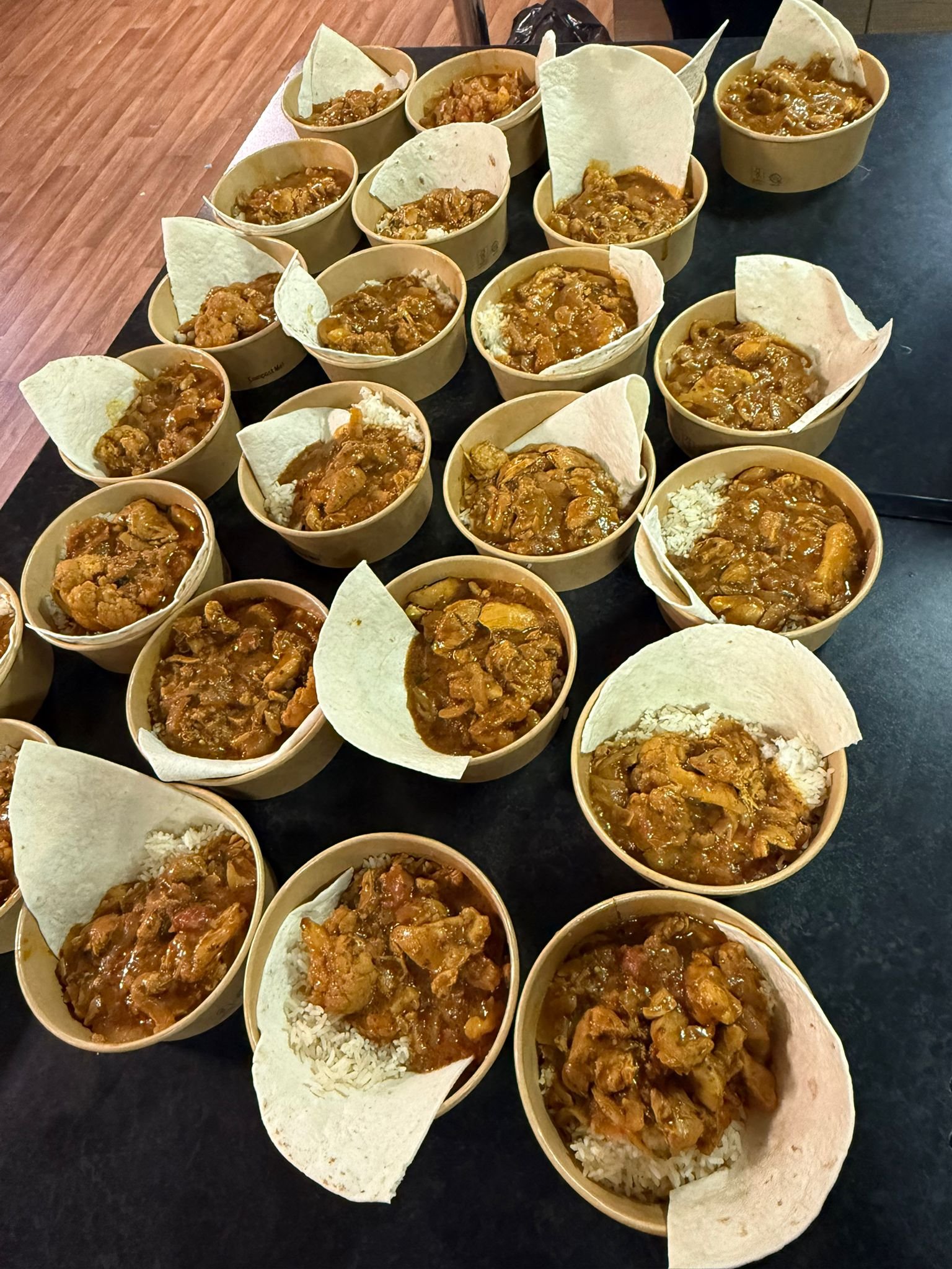 Weekly cooking sessions with families, including shared meal preparation, delivered in partnership with Bangers n Mash CIC