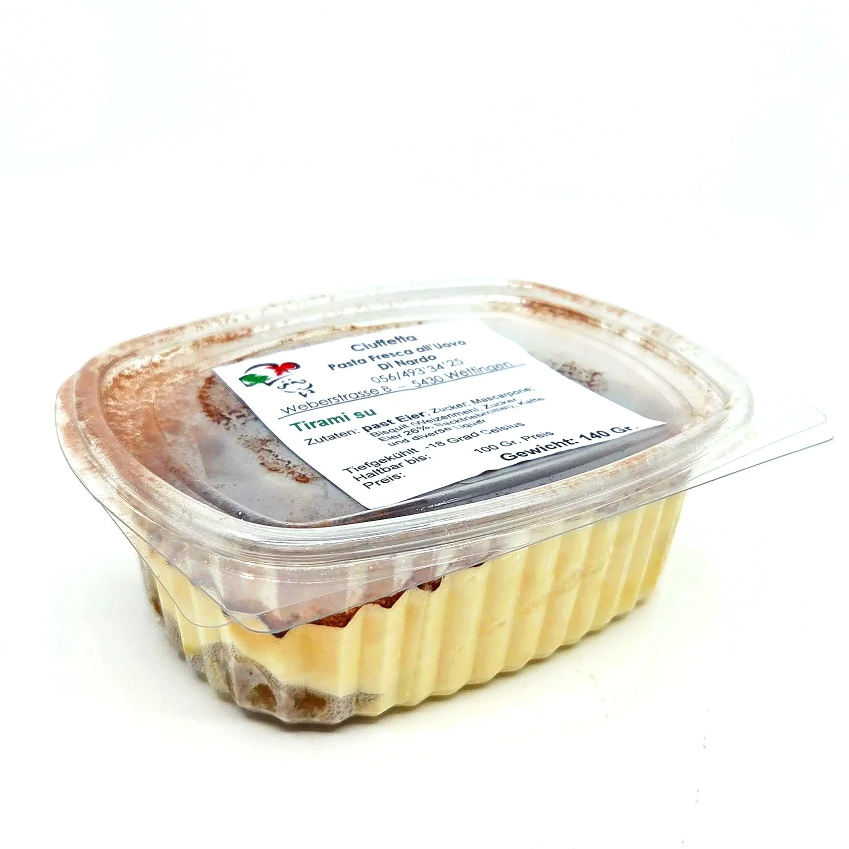 Vorratsbehälter mit italienischem Tiramisù, Bezeichnung auf Etikett hängt schräg