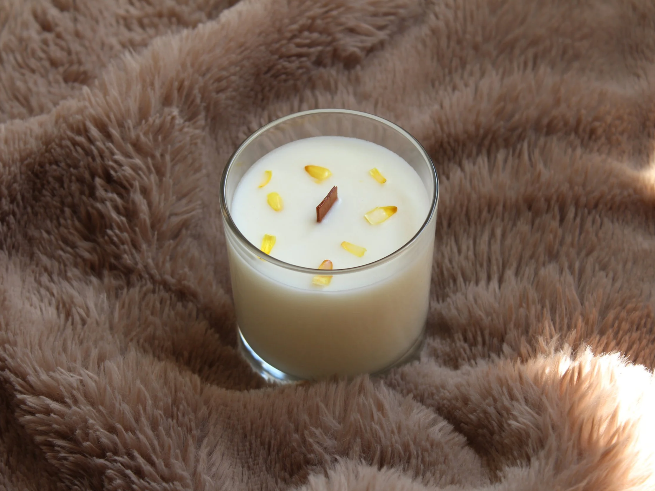 Pear and freesia scented soy candle in glass jar with wooden wick, decorated with dried flowers, by Mara Candles