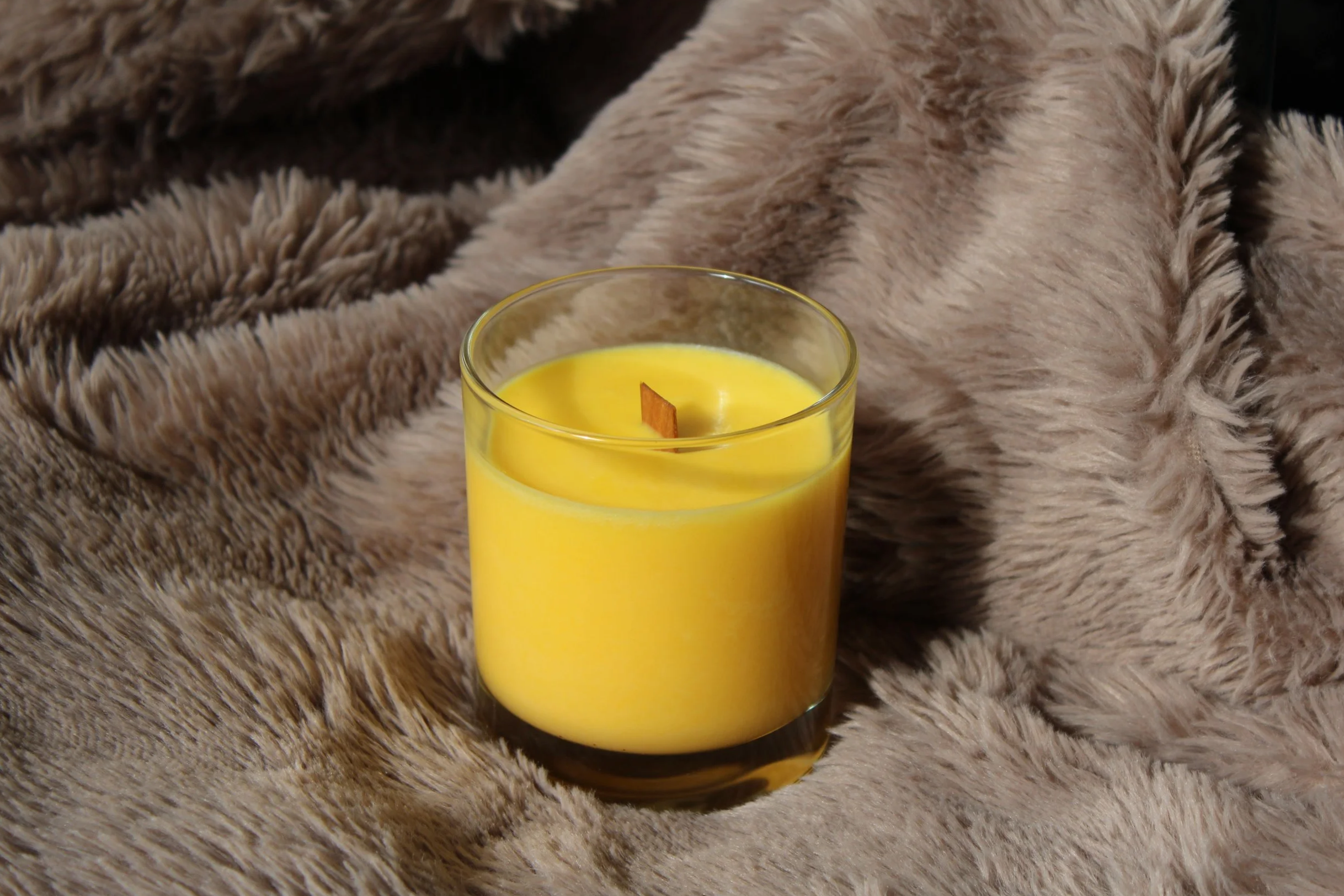 Sandalwood and black pepper scented soy candle in glass jar with wooden wick, by Mara Candles