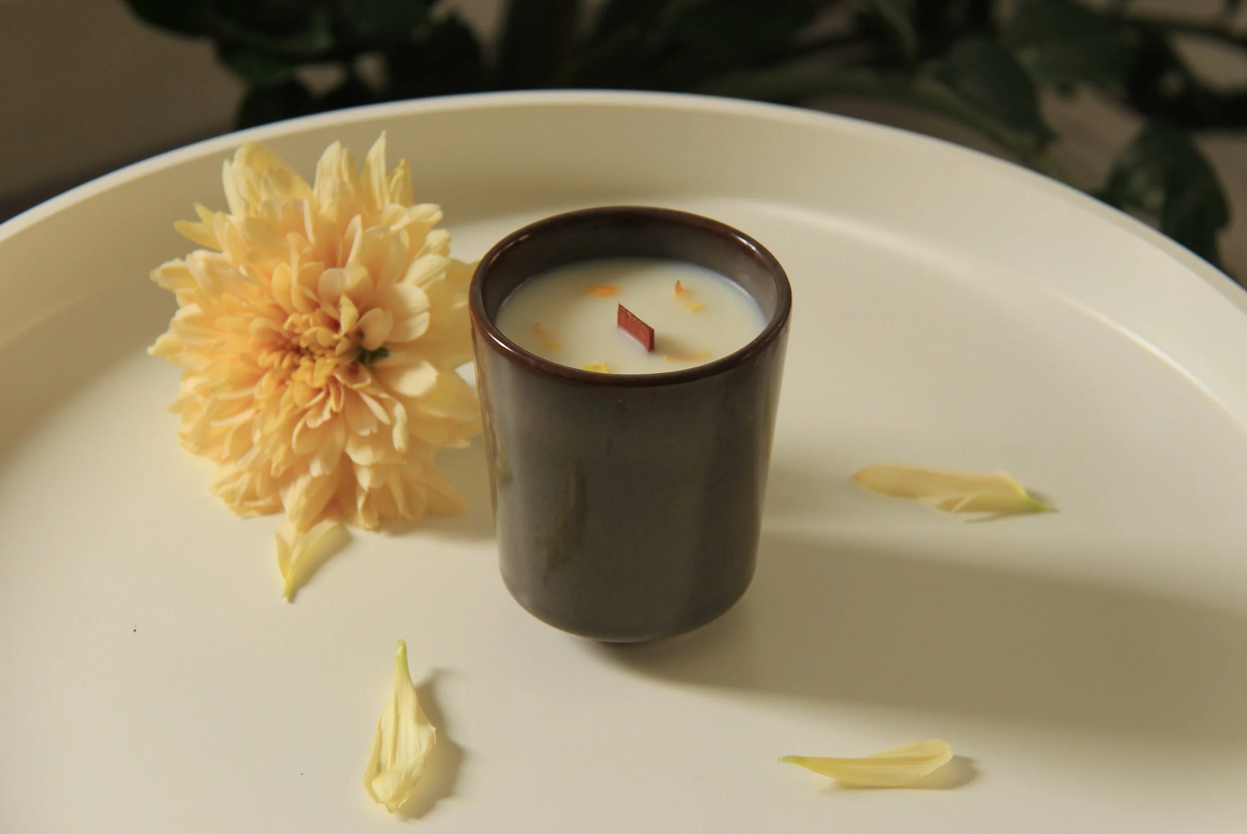 Pear and freesia scented soy candle in glass jar with wooden wick, decorated with dried flowers, by Mara Candles