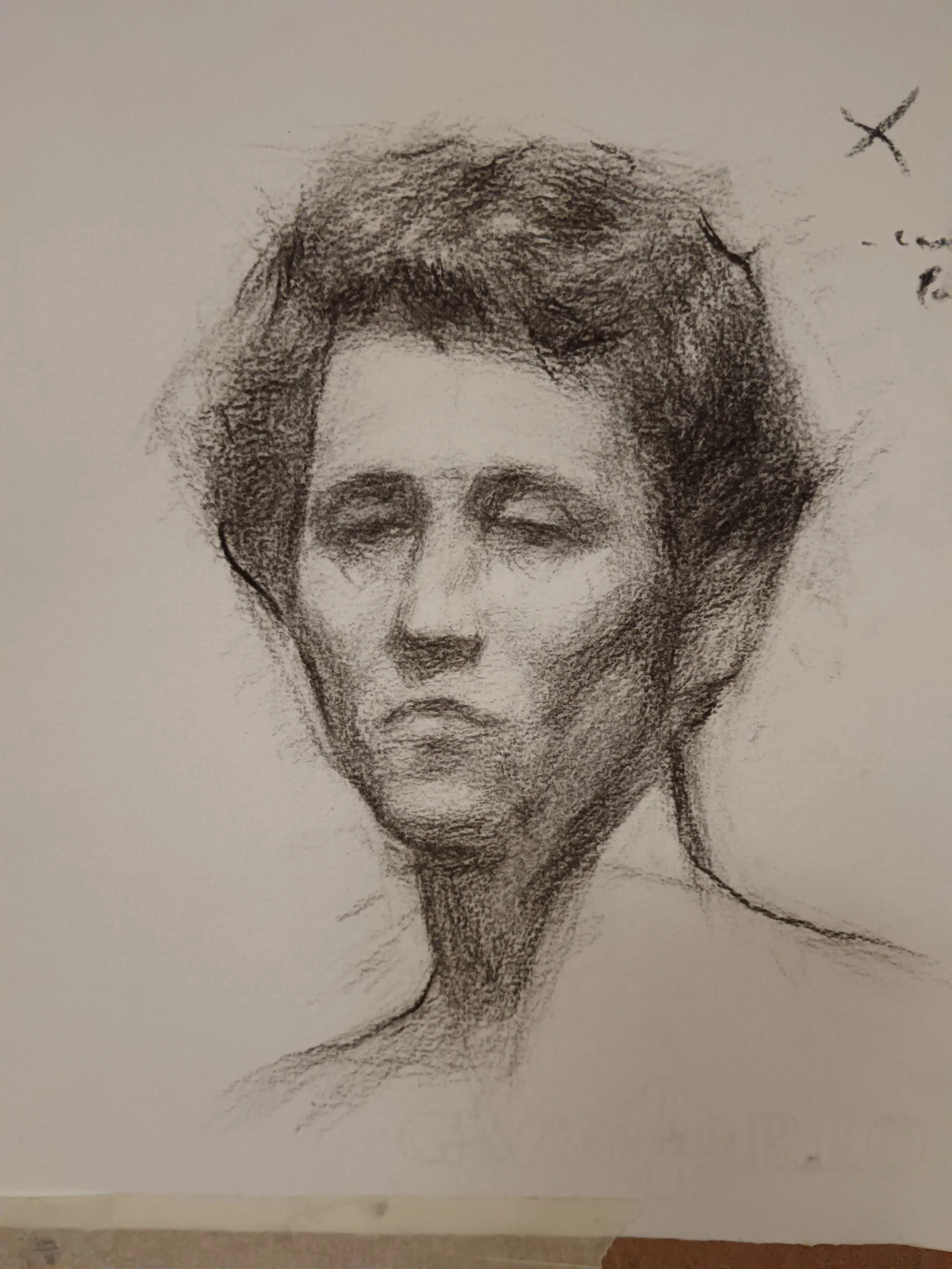Sketch of a man with closed eyes, tousled hair, and a serious expression.