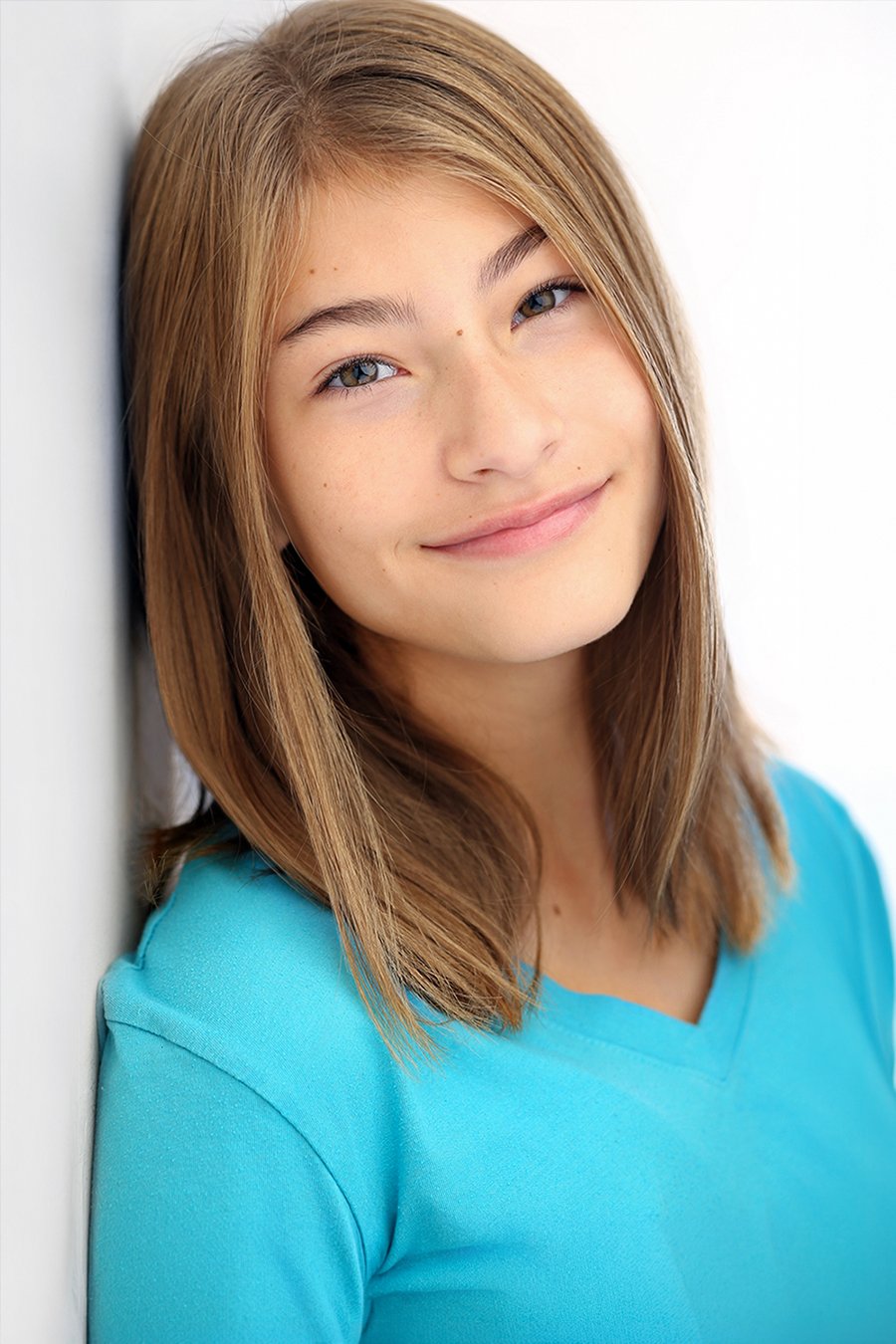 kids blonde actress blue shirt_(2).jpg