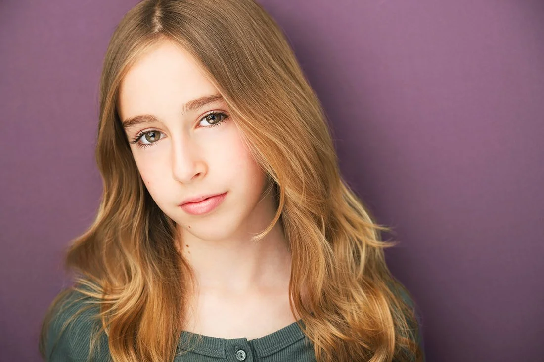 youth-headshot-bright-color-background-web_orig (1).jpg