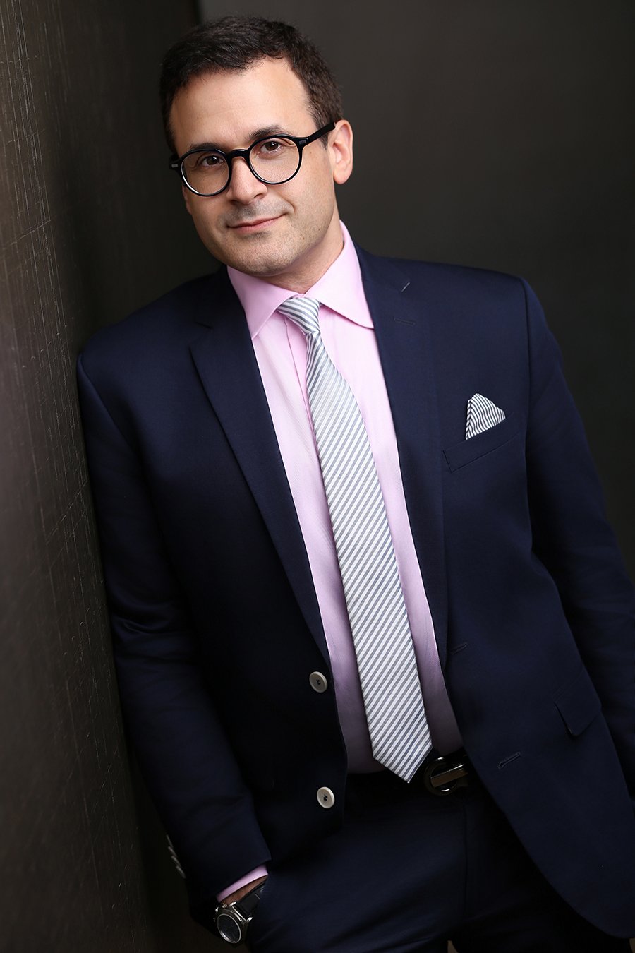 pink shirt businessman glasses in office.jpg