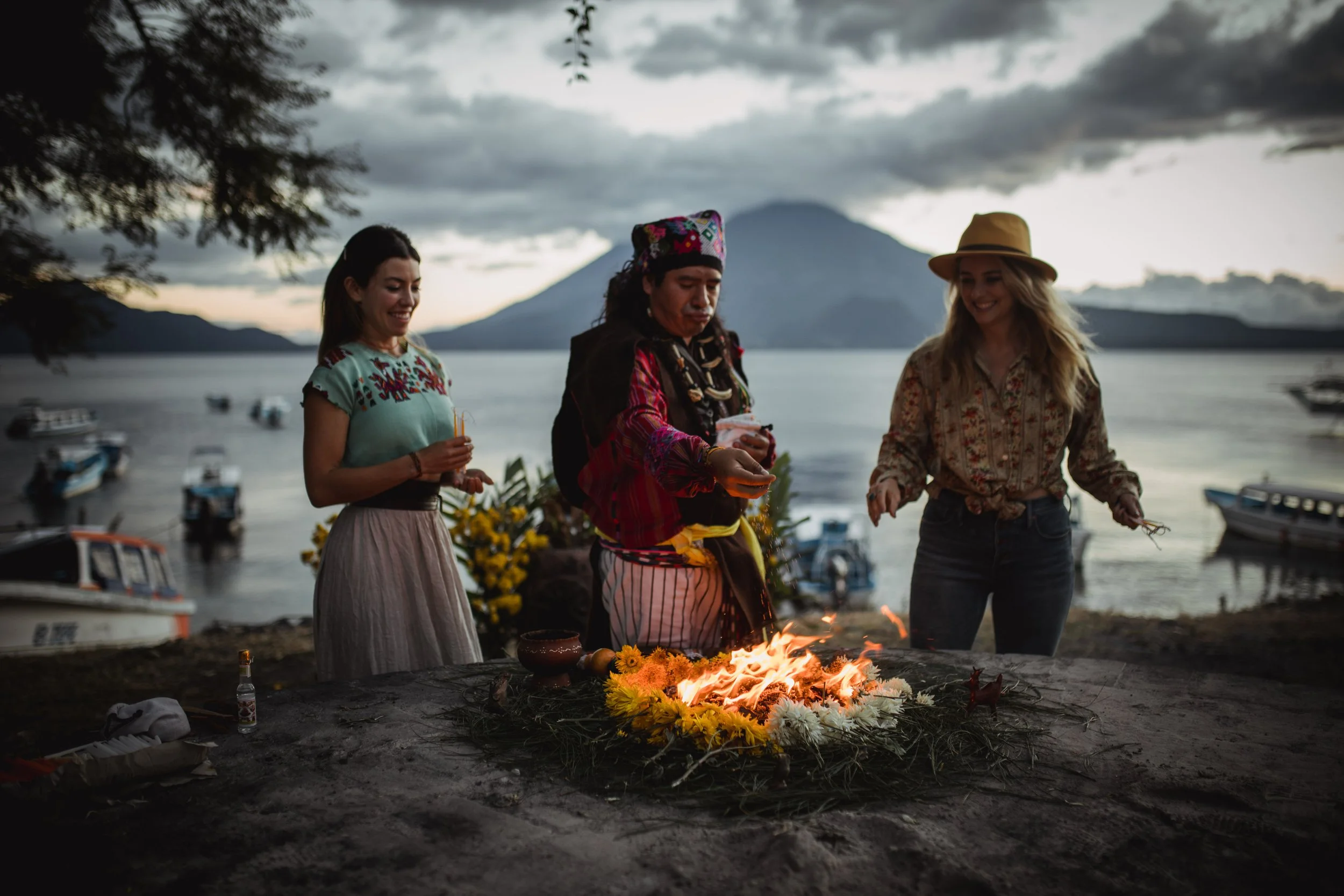 Traditional Maya ceremony with trans cultural leaders on the shores of Lake Atitlán, Guatemala.