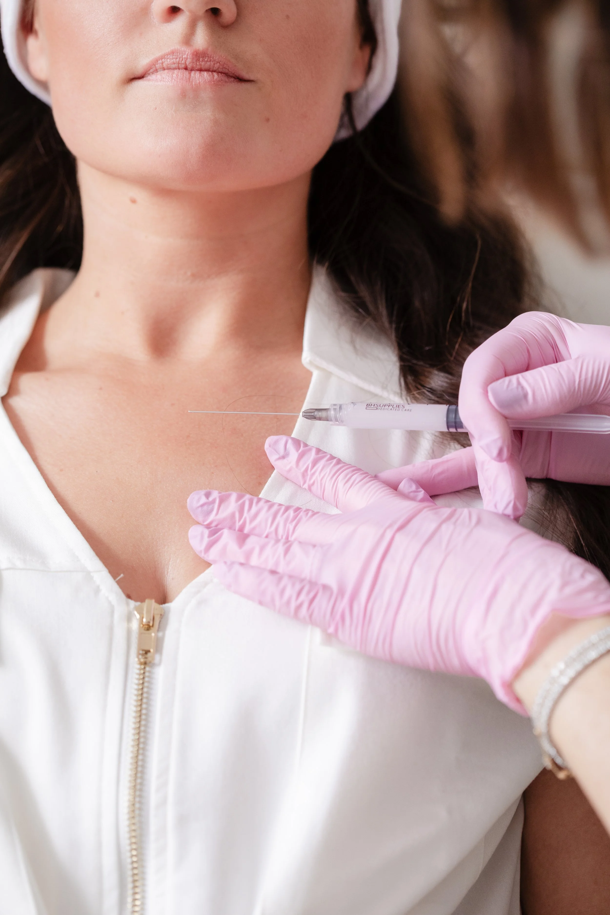 Client receiving a cosmetic injection at Casey Powell PA