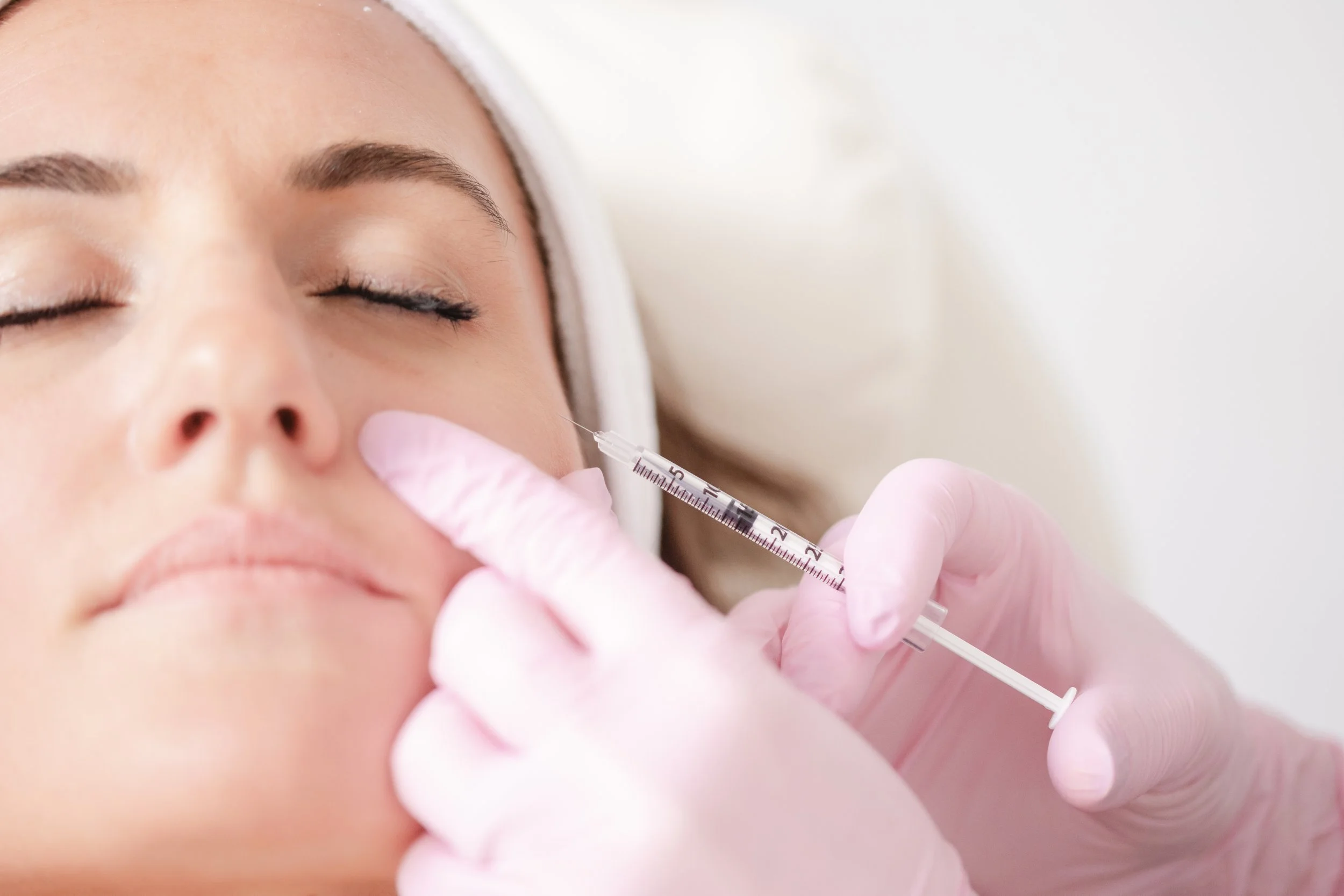 Client receiving a cosmetic injection at Casey Powell PA