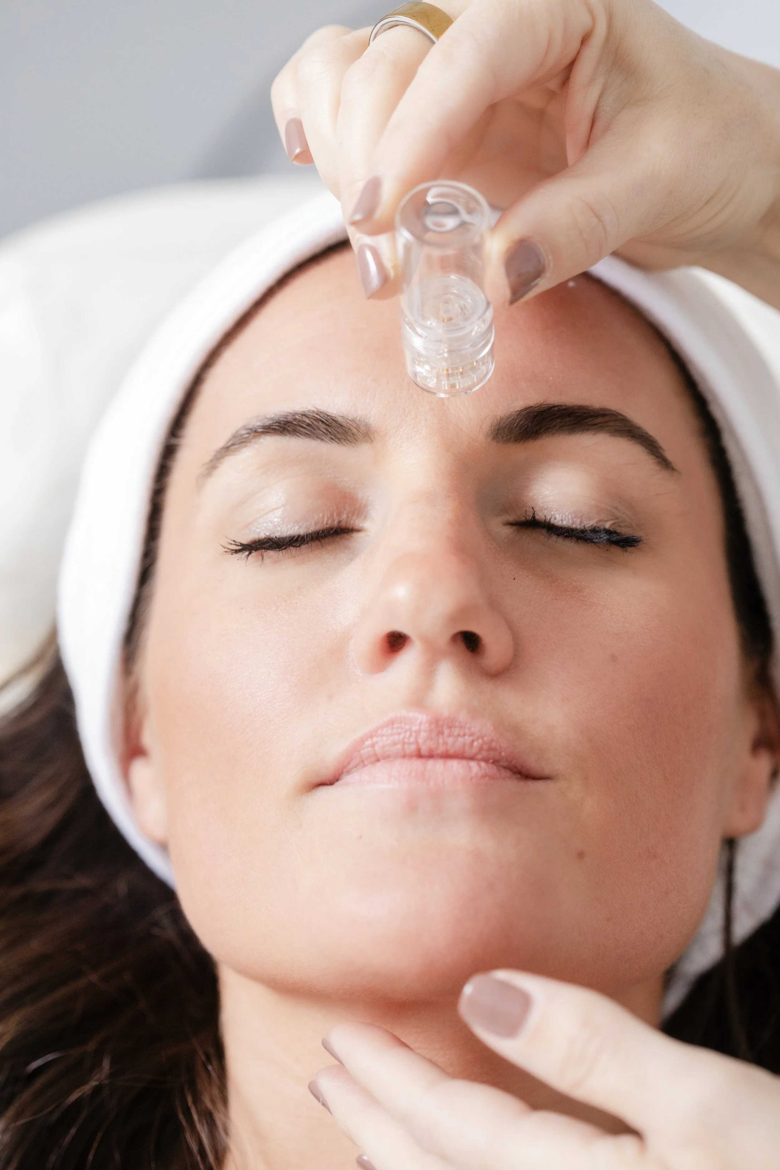 A client receiving a facial treatment