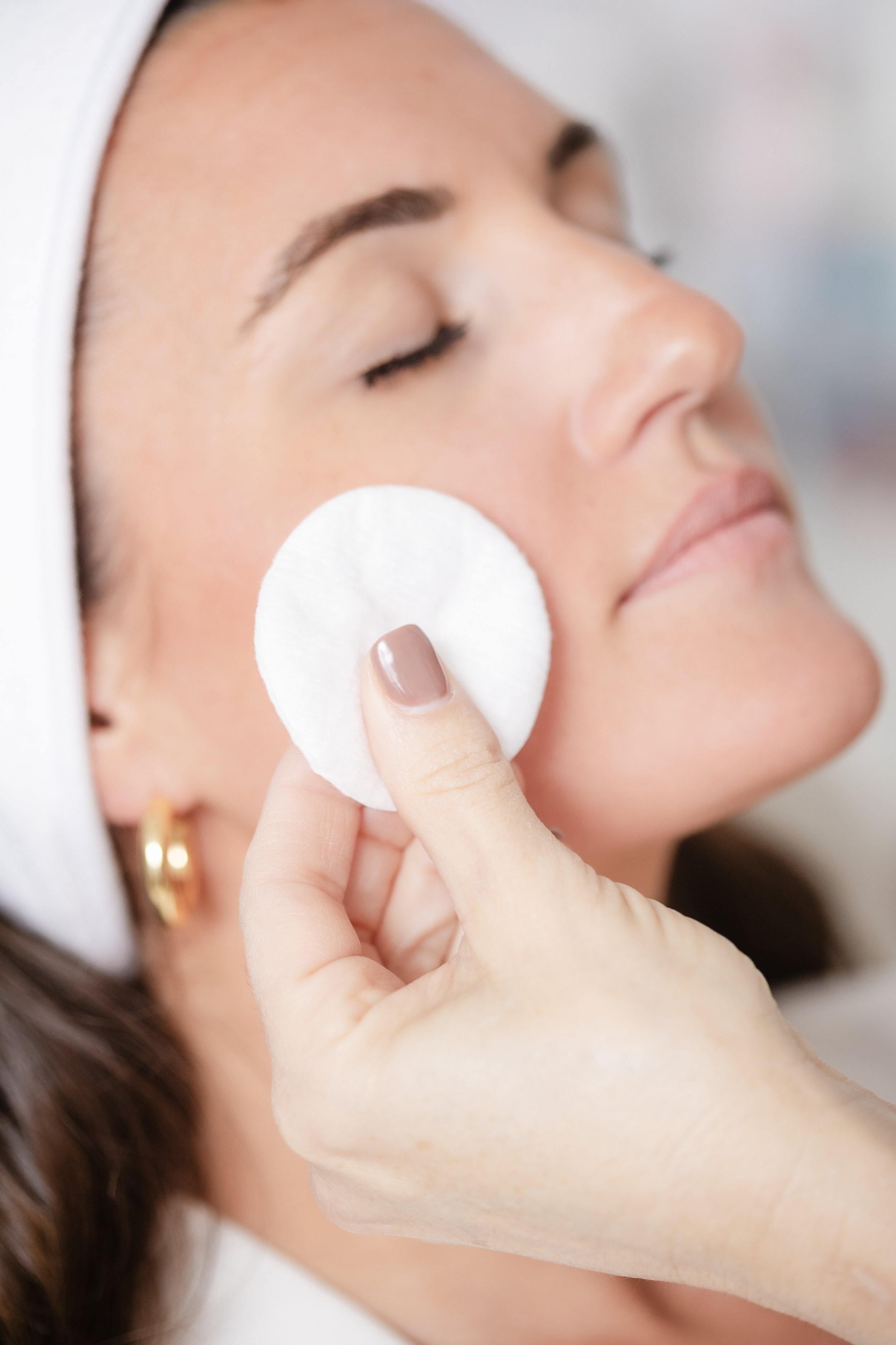 A client receiving a facial treatment