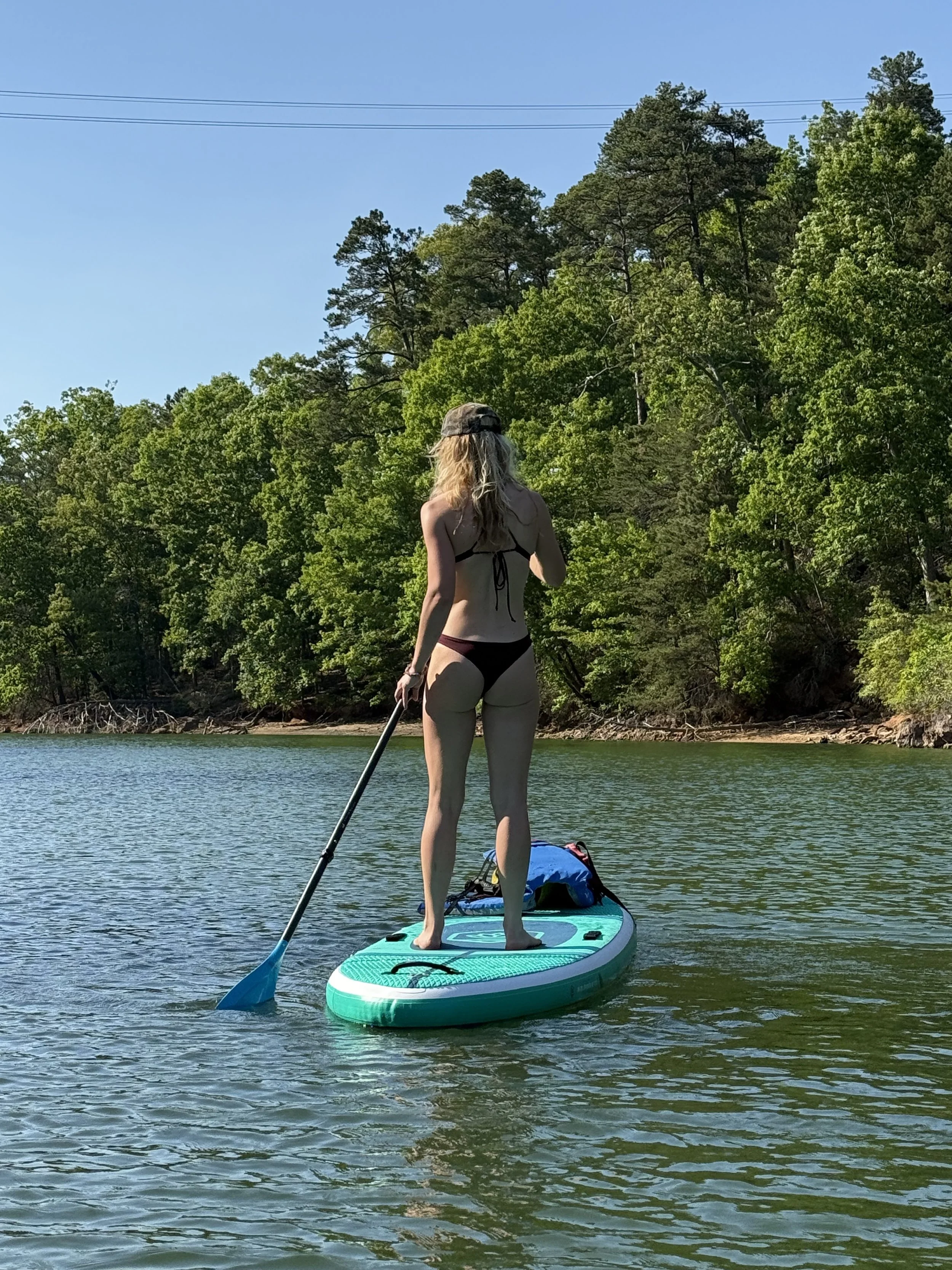 Summer paddleboarding on Lake Norman with beginner-friendly SUP board