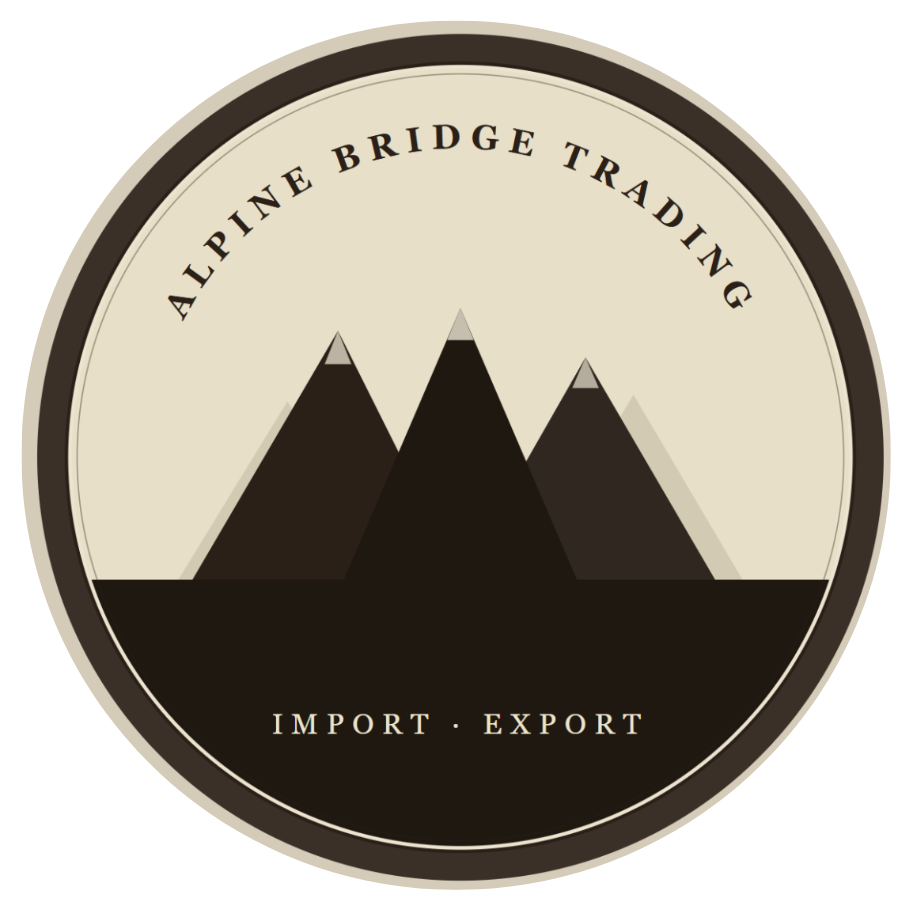 A circular logo for Alpine Bridge Trading featuring stylized mountains and the text "Alpine Bridge Trading" at the top and "Import · Export" at the bottom.