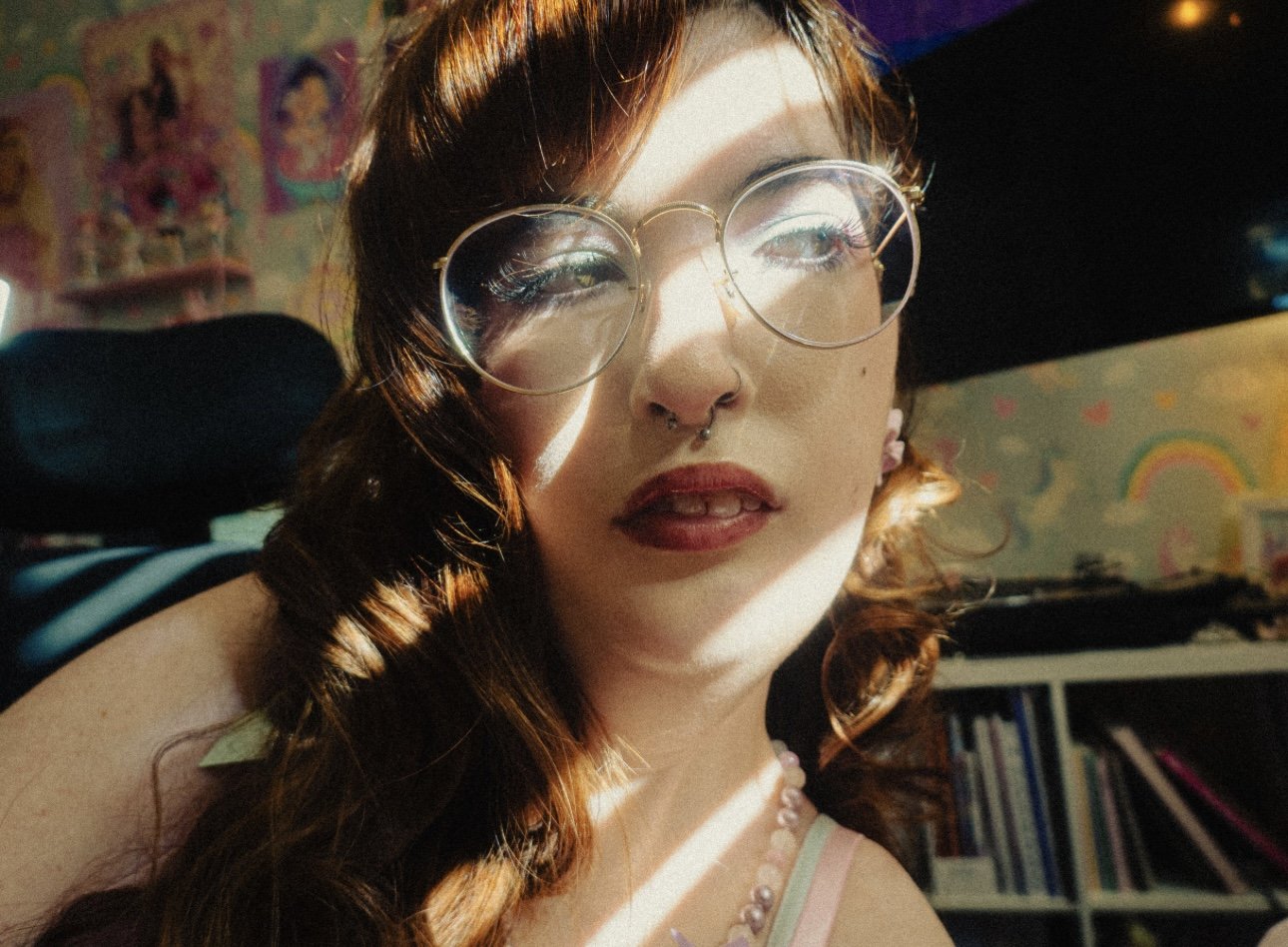 PHOENIX BARFUSS
An artist based in Sacramento, CA. Being a bisexual and disabled woman filters her creativity through a unique lens. Perfectly blending traditional and digital art in her projects. While her main passion is digital illustration and mi