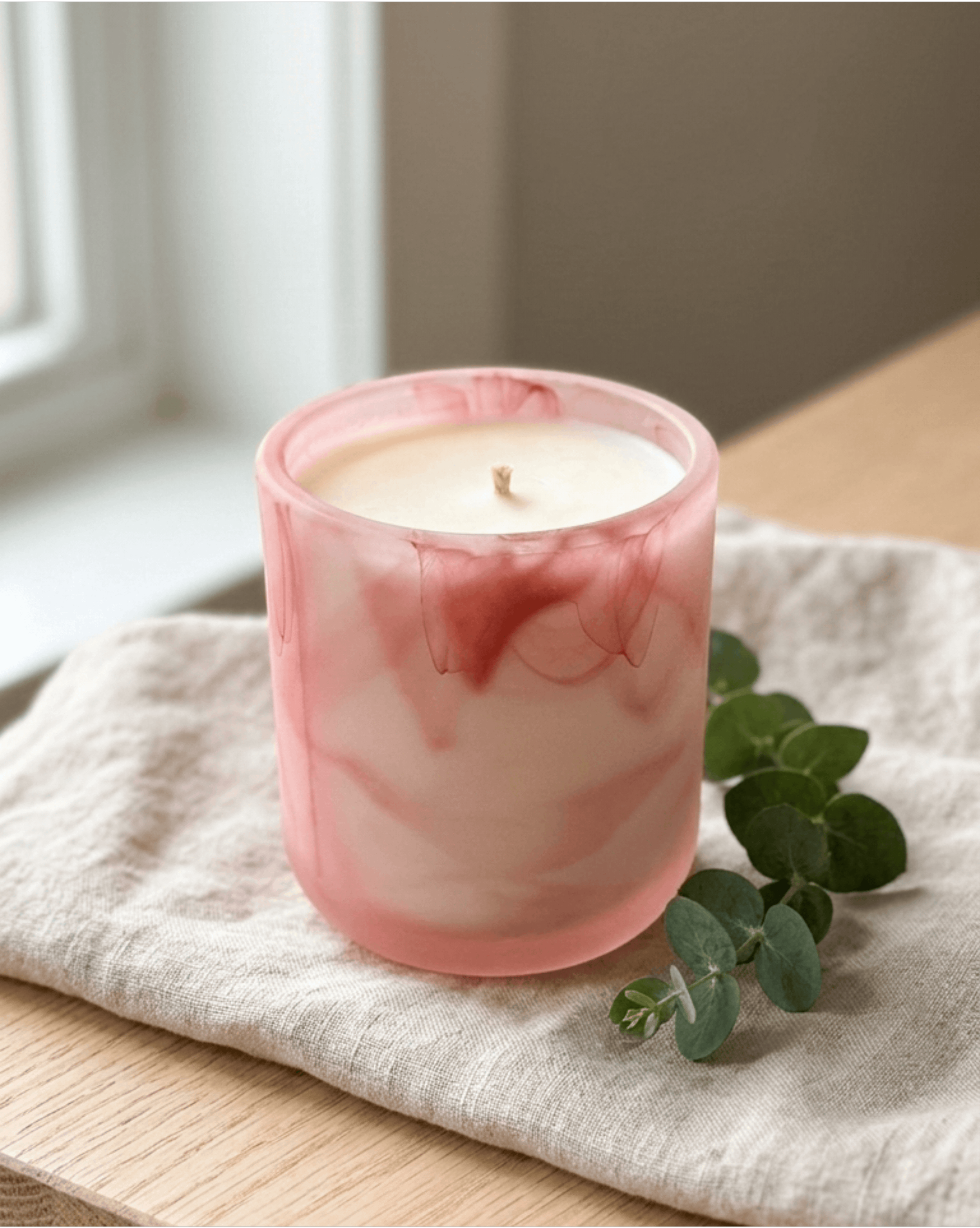 Creamy Ember candle in Pink Swirl vessel