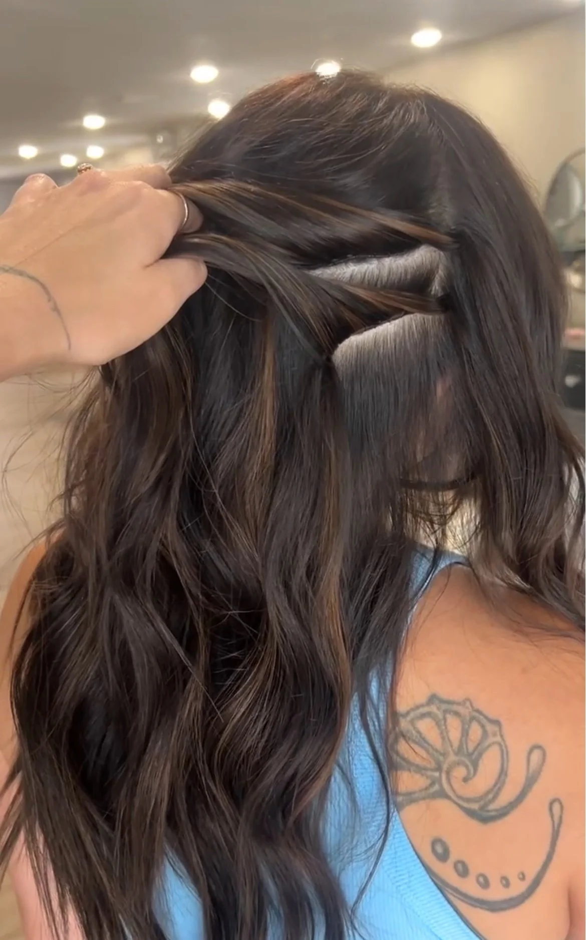 Hand-tied hair extensions at Bengal & Mane in Gaylord, MI