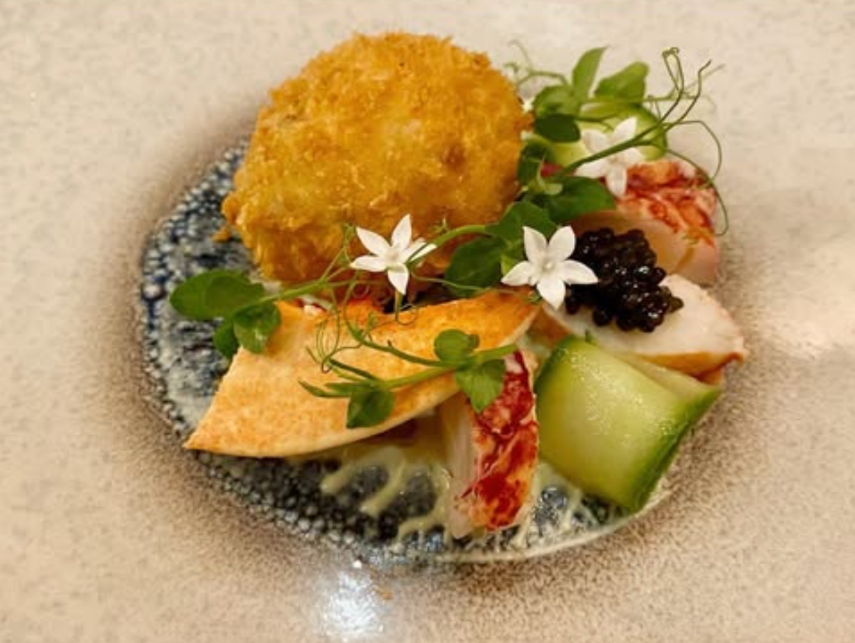 Lobster Scotch Egg, Butter Poached Lobster, Cucumber Crème Fraîche, Pickled Cucumber, Herb Oil, Royal Caviar & Cucumber Dust