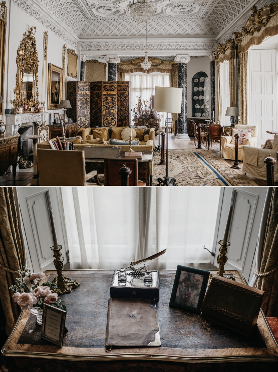 A luxurious hotel or mansion living room with ornate classic decor, including a chandelier, gold-framed mirrors, and antique furniture. The room features a large Persian-style rug, velvet drapes, and various seating arrangements. In front of tall win