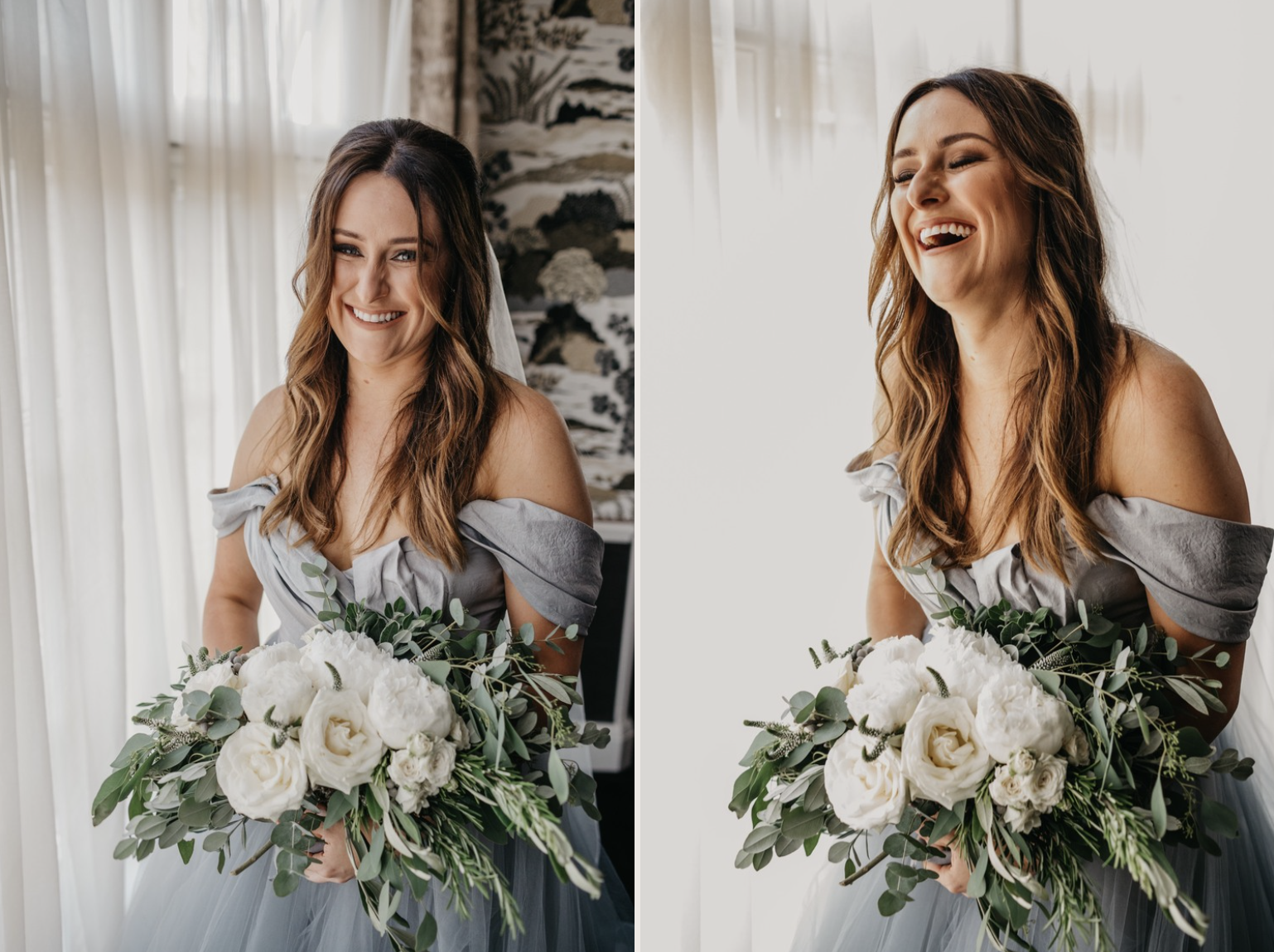 A bride holding a large bouquet of white roses, peonies, and green foliage, smiling and laughing in a well-lit room with a neutral background.