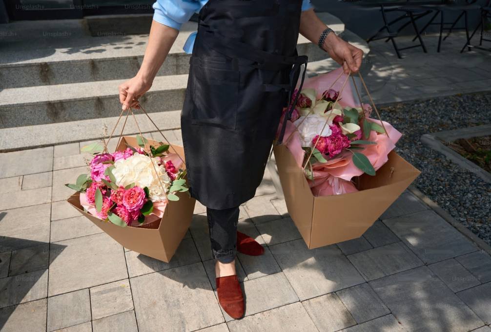 Betty from The Florist By The Sea delivering flowers